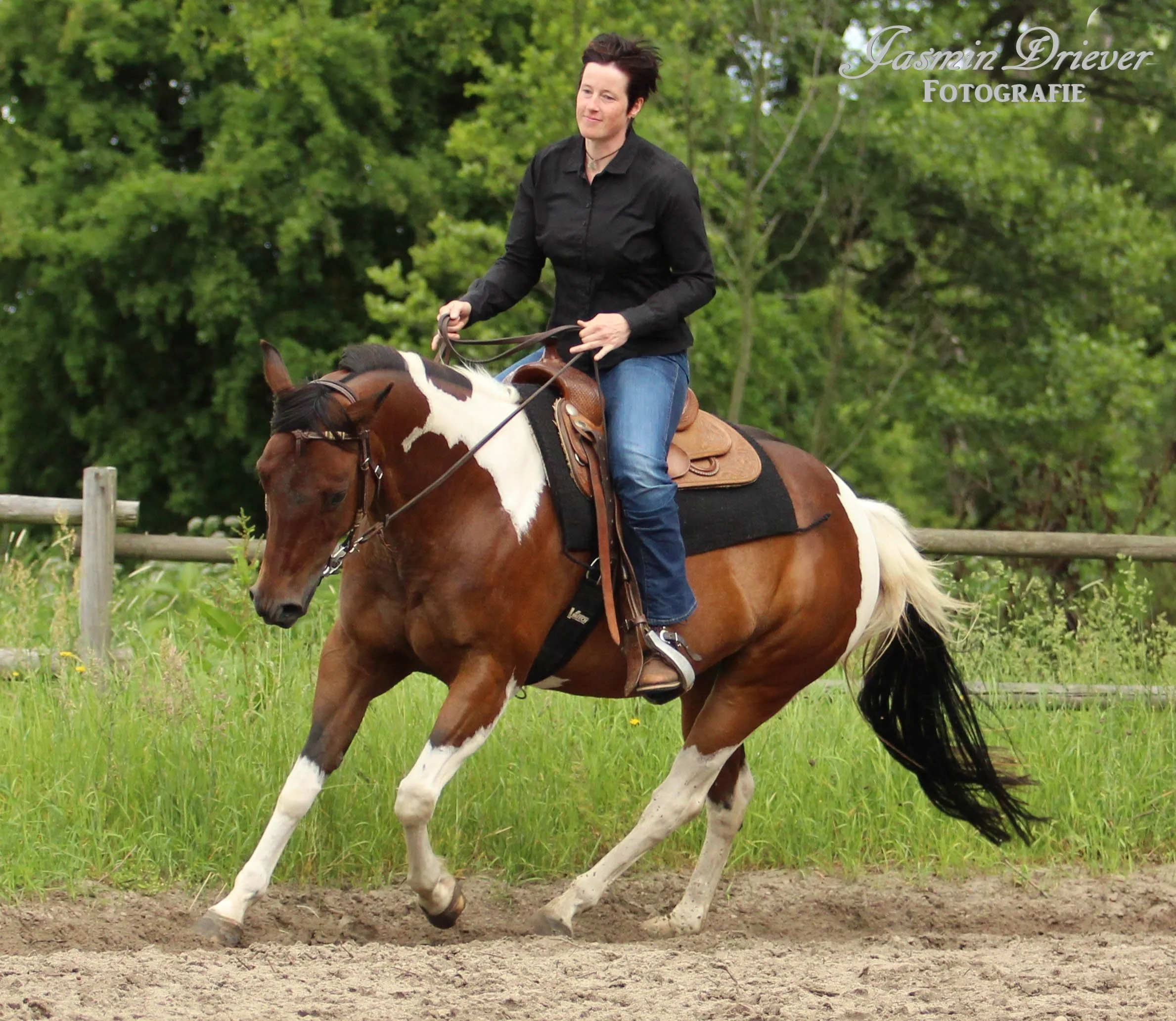 Britta and her horse Sunny happily cantering in union and comfort