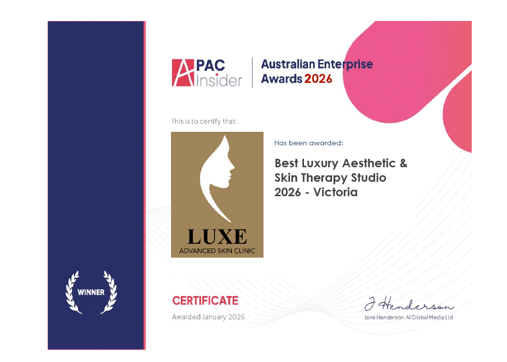 Certificate of award from the Australian Enterprise Awards 2026, presented to LUXE Advanced Skin Clinic in Victoria for Best Luxury Aesthetic & Skin Therapy Studio 2026, signed by Jane Henderson, with a logo and decorative pink shapes.