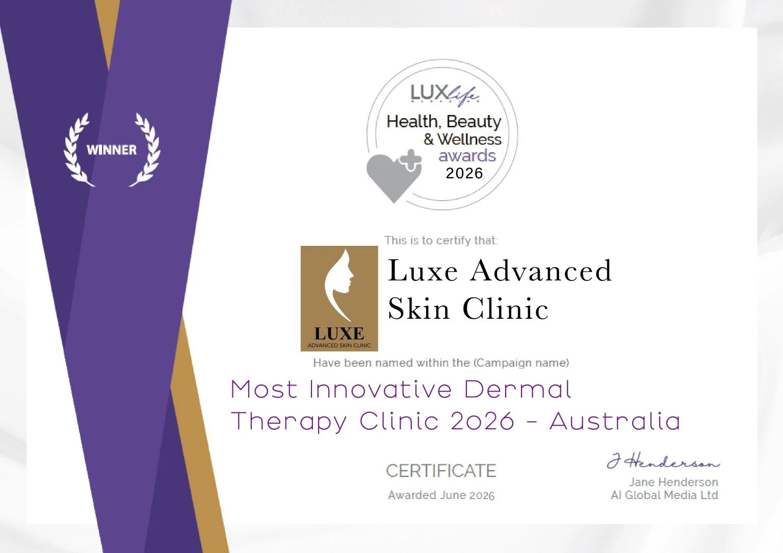 Certificate of award for Luxe Advanced Skin Clinic as Most Innovative Dermal Therapy Clinic 2026 in Australia, awarded June 2026, signed by Jane Henderson from AI Global Media Ltd, featuring a logo with a woman's face profile and the word LUXE, and a purple and gold decorative ribbon on the left side.