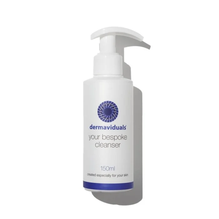 A white pump bottle labeled 'dermaviduals your bespoke cleanser 150ml created especially for your skin' with a blue logo, set against a white background.