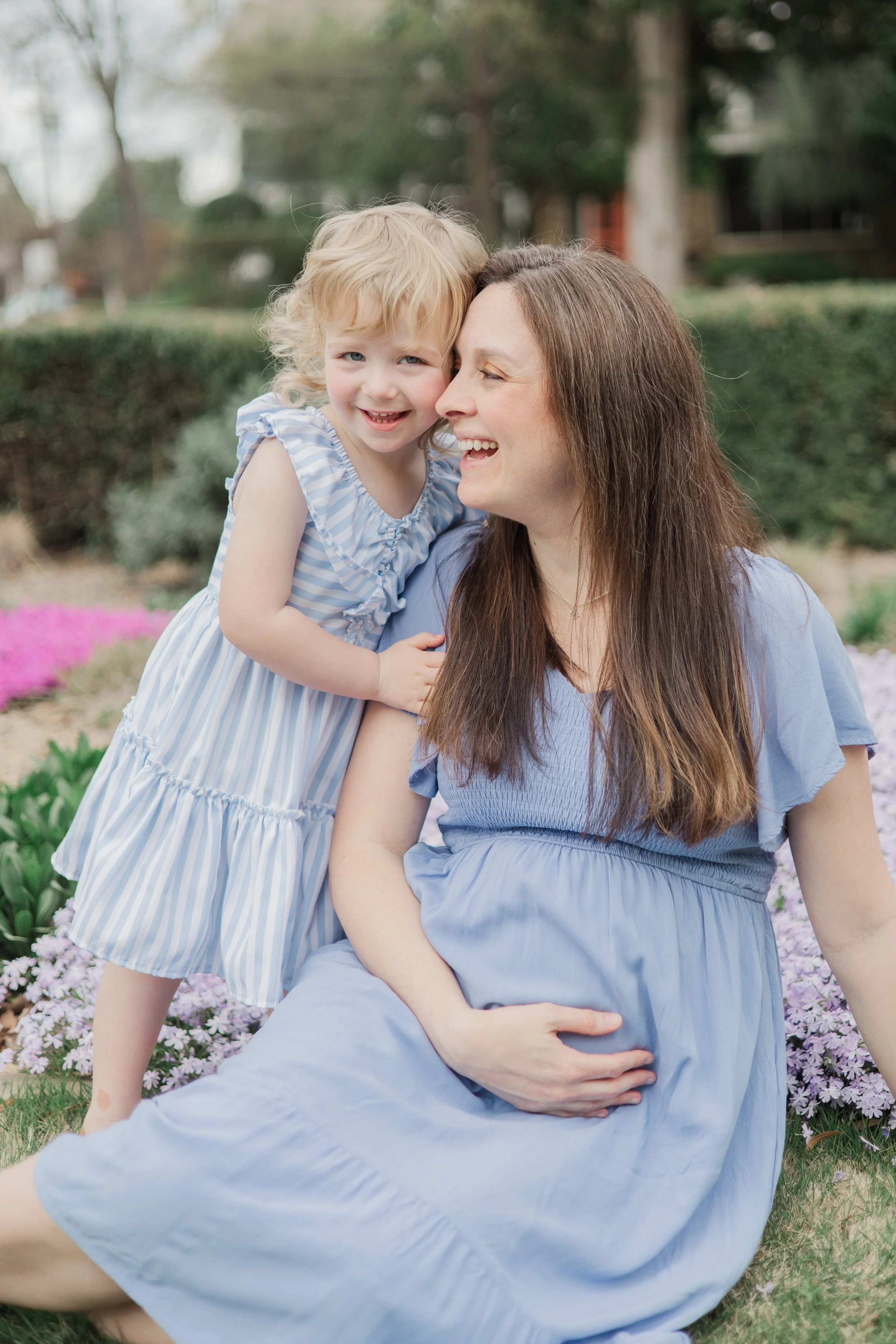 Maternity Photoshoot in Charlotte North Carolina with Toddler Hugging Pregnant Mother