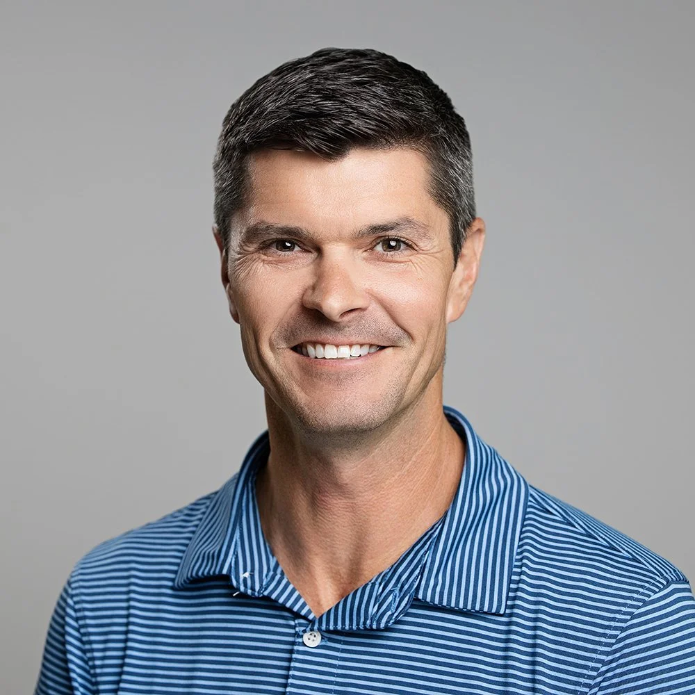 Jeff Kuhn, owner of Kuhn Events, smiling in a blue polo shirt, business headshot
