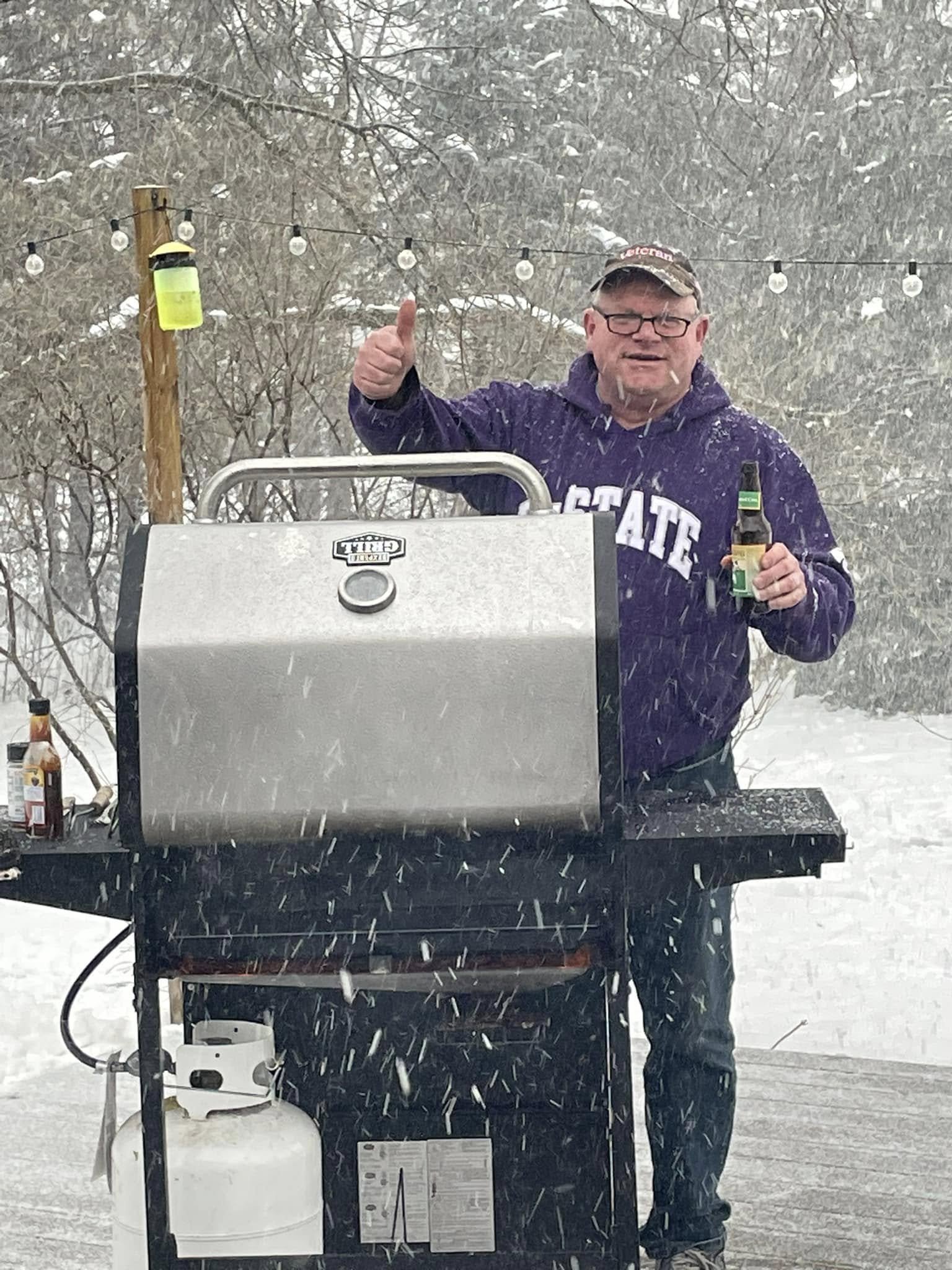 Tim Paterson grilling in the snow.