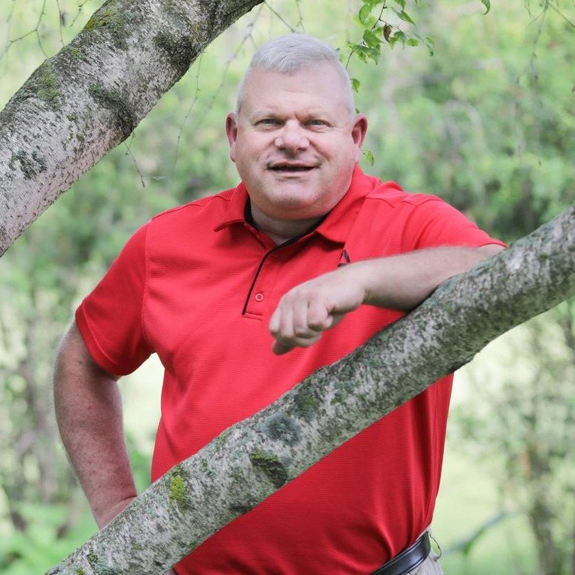 Tim Paterson posing for a professional photo.