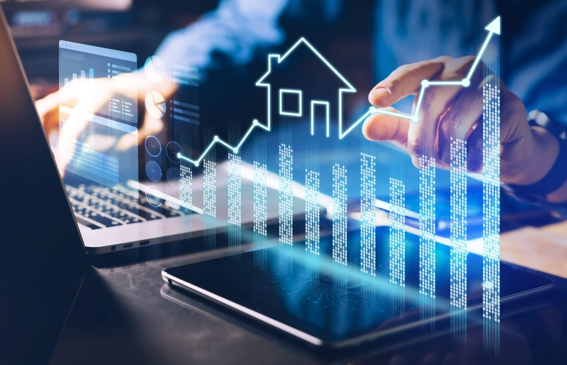 Digital illustration of a person interacting with holographic graphs and icons related to real estate growth, with a laptop and a smartphone on the table.