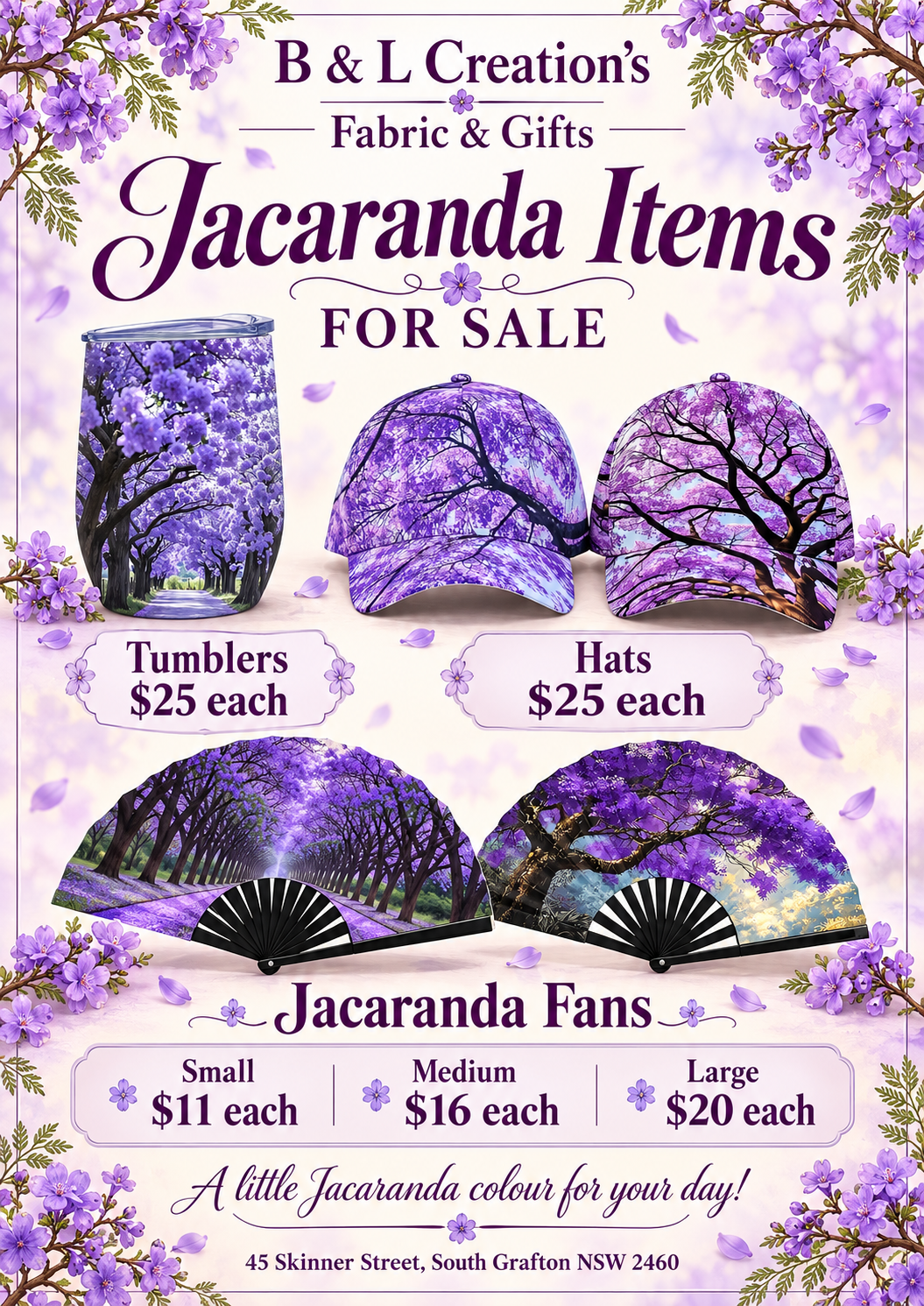 A promotional poster for B & L Creation's Fabric & Gifts, featuring Jacaranda-themed items. The poster displays three designs of Jacaranda motifs on items for sale: a tumbler, a hat, and a fan. The tumbler costs $25 each, the hats are $25 each, and the fans come in small, medium, and large sizes priced at $11, $16, and $20 respectively. The background is decorated with illustrations of purple Jacaranda flowers and branches, with the shop's address at 45 Skinner Street, South Grafton, NSW 2460.