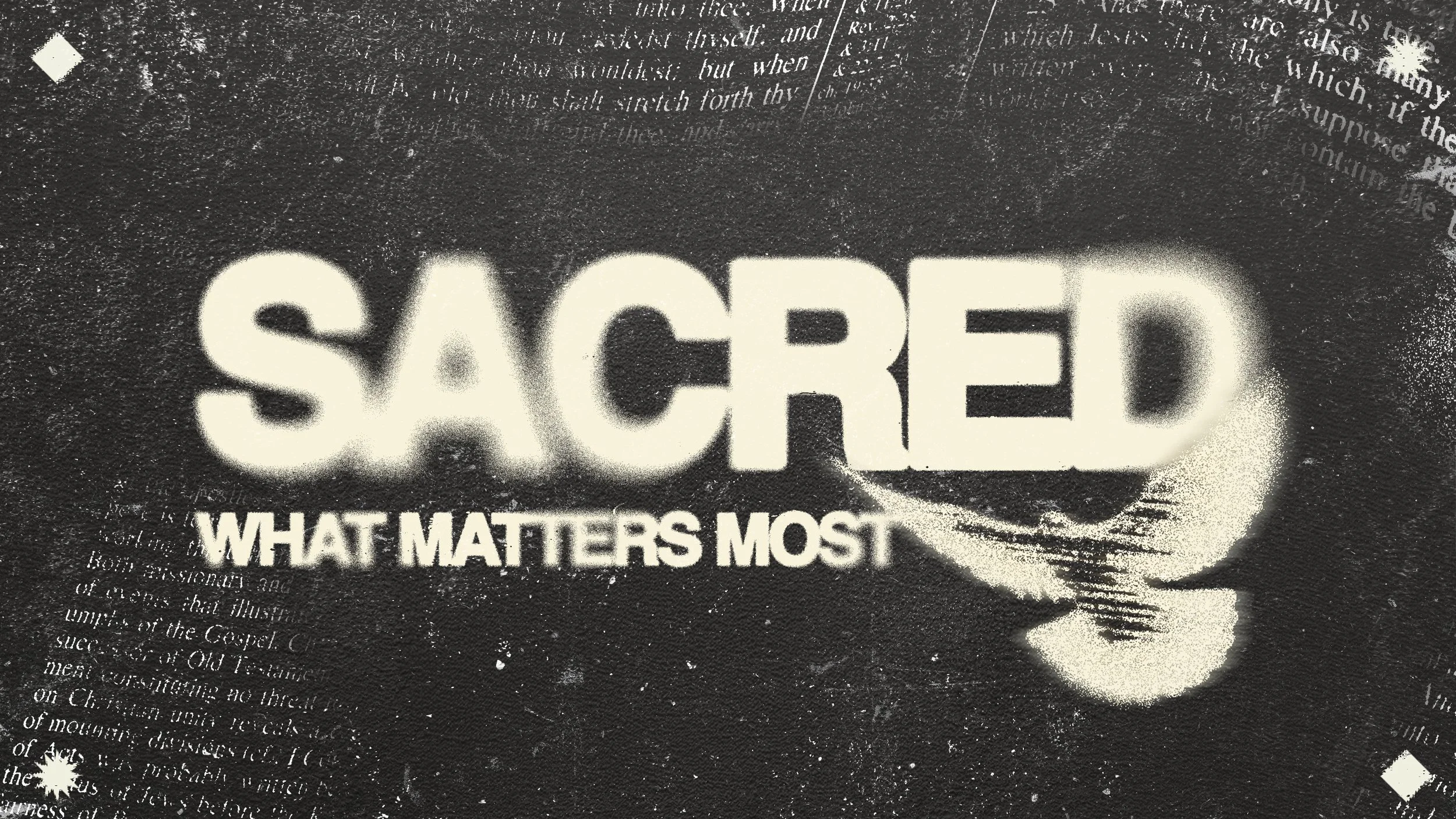 Close-up of a youth event banner with the word 'SACRED' in large white letters and the phrase 'WHAT MATTERS MOST' underneath, featuring a black and white color scheme with a textured background.