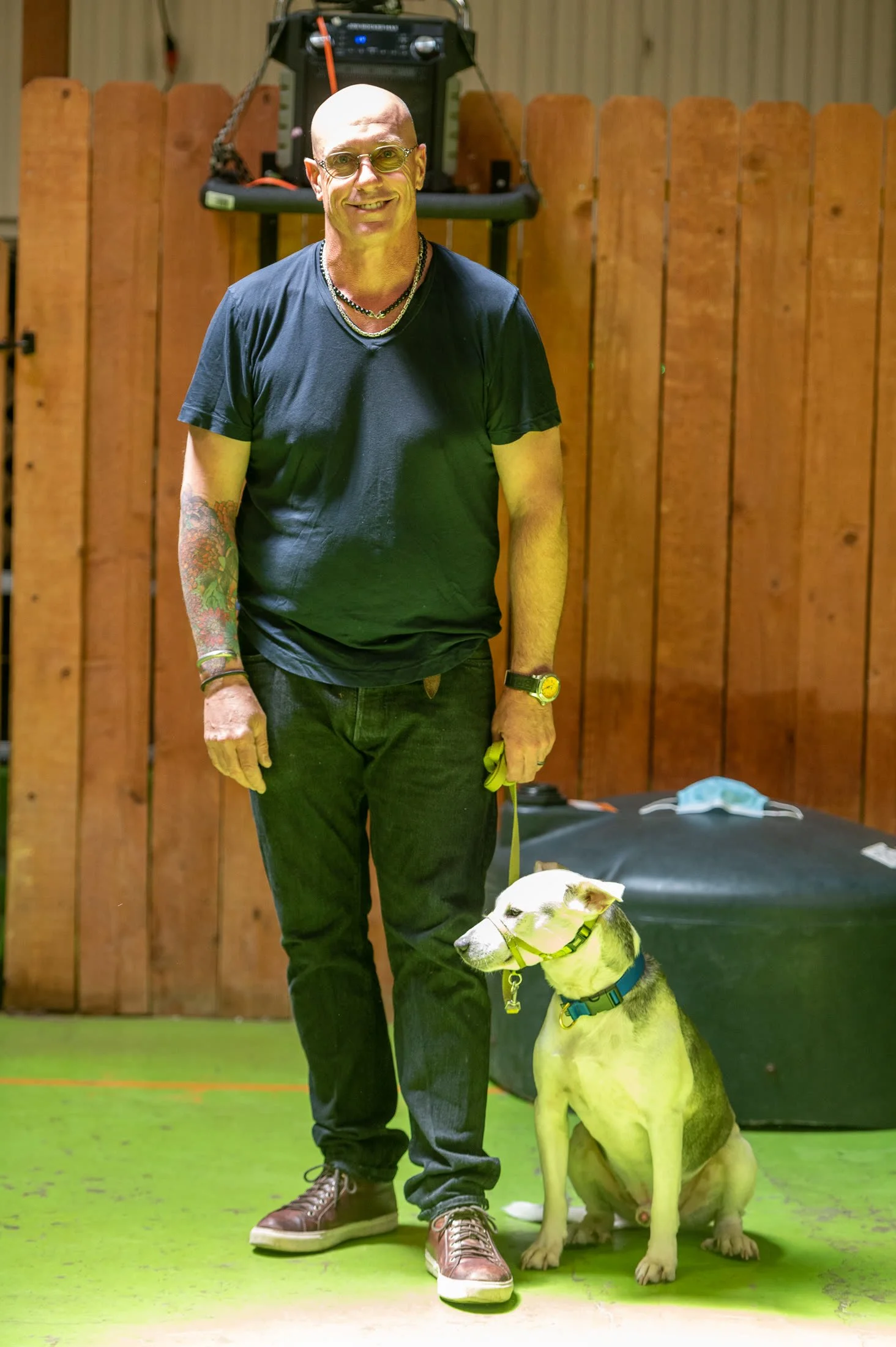Dan Perata working with a dog on the training floor at the San Francisco facility