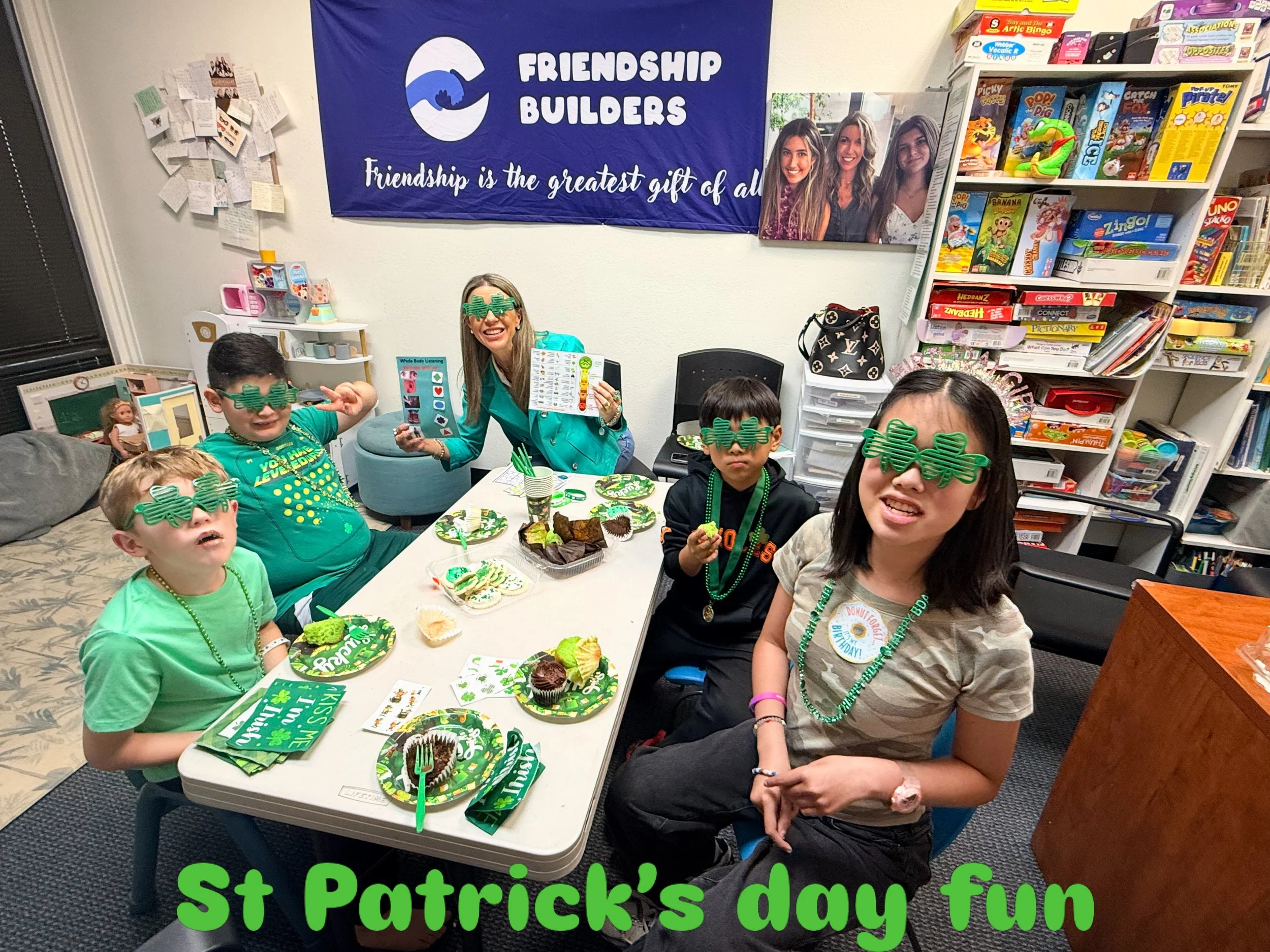 kids having fun at a social skills party at Friendship Builders wearing st. Patrick's day themed costumes