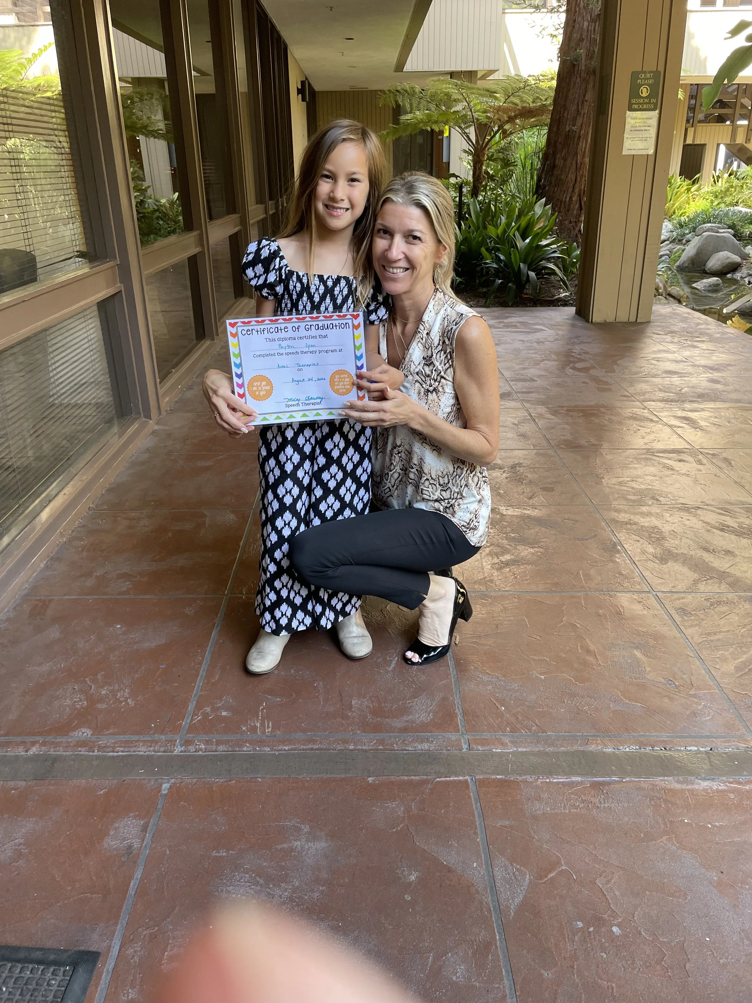 Owner of Friendship Builders graduating a student from social skills in Newport Beach