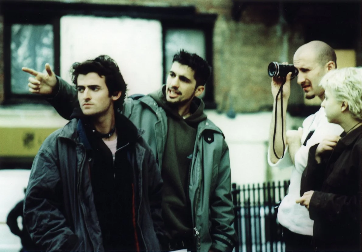 90s NYC independent punk film set of the punk-classic 'Threat,' with star Carlos Puga, director Matt Pizzolo, cinematographer Benjamin Brancato, and producer Katie Nisa.