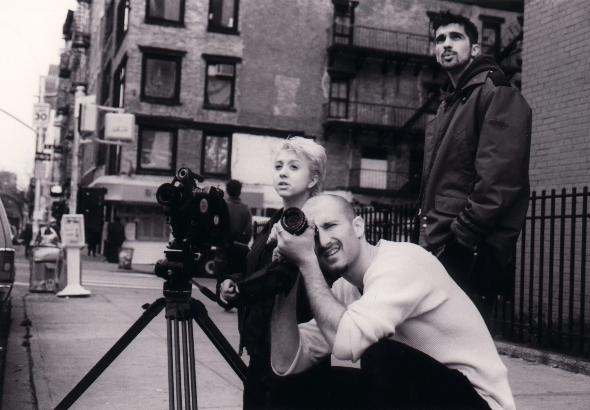 Independent filmmakers on set of the NYC indie movie 'Threat' including producer Katie Nisa, cinematographer Ben Brancato, and director Matt Pizzolo.