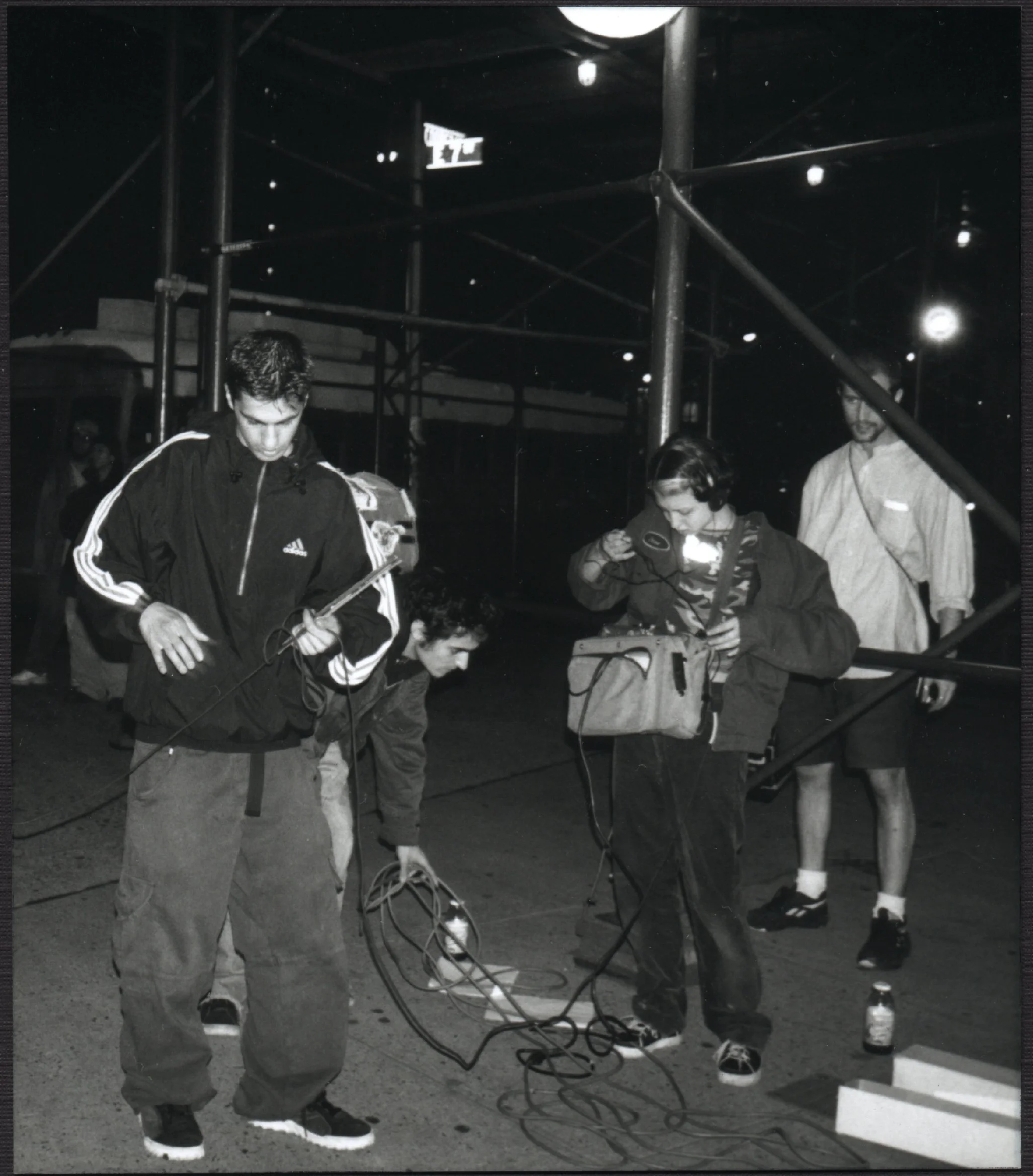 Independent filmmakers with nagra, boom, and 16mm camera producing 90s NYC indie movie 'Threat'.