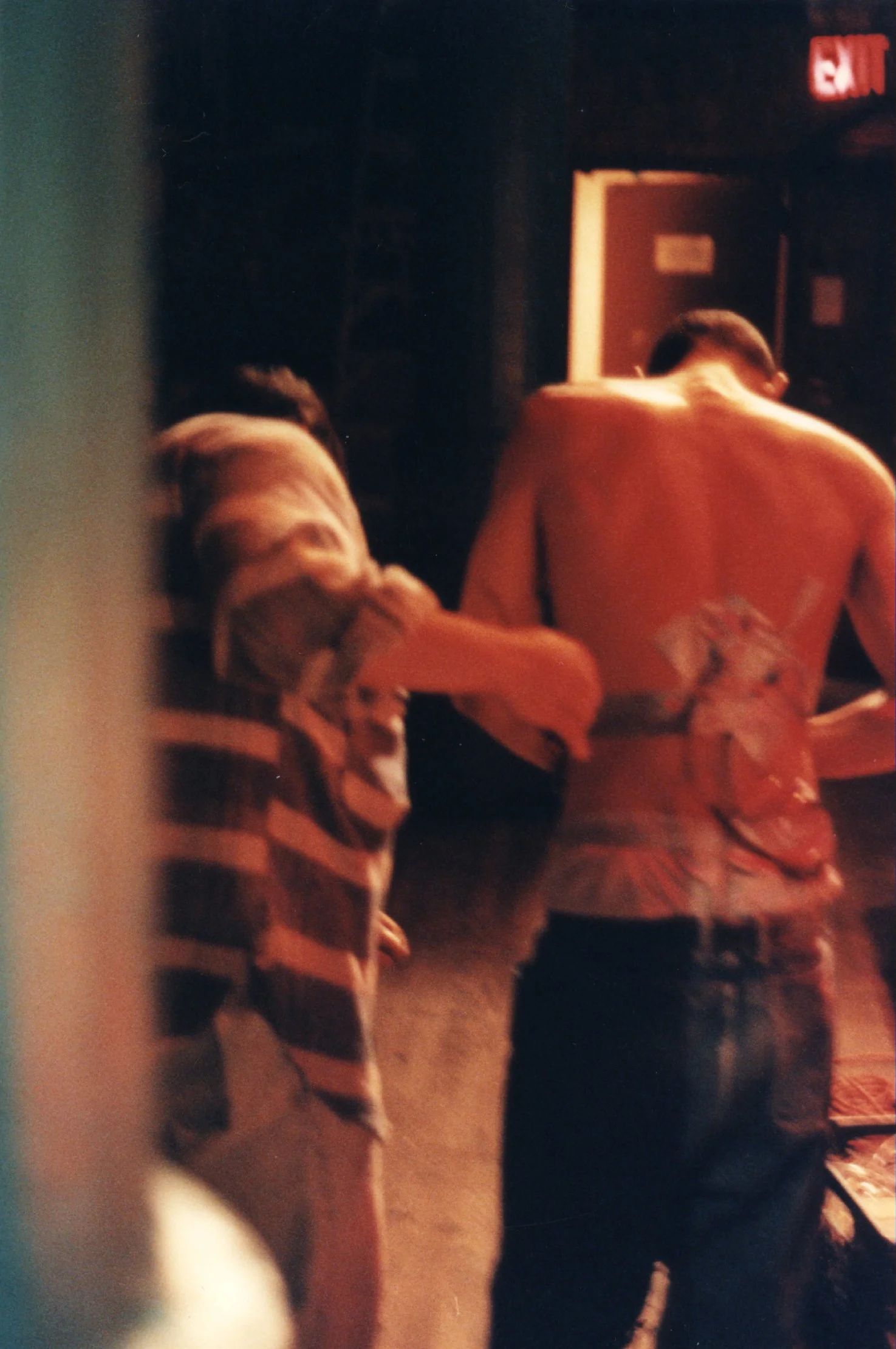 Independent film special effects team applies a blood squib on an actor for 1990s NYC indie movie 'Threat'.