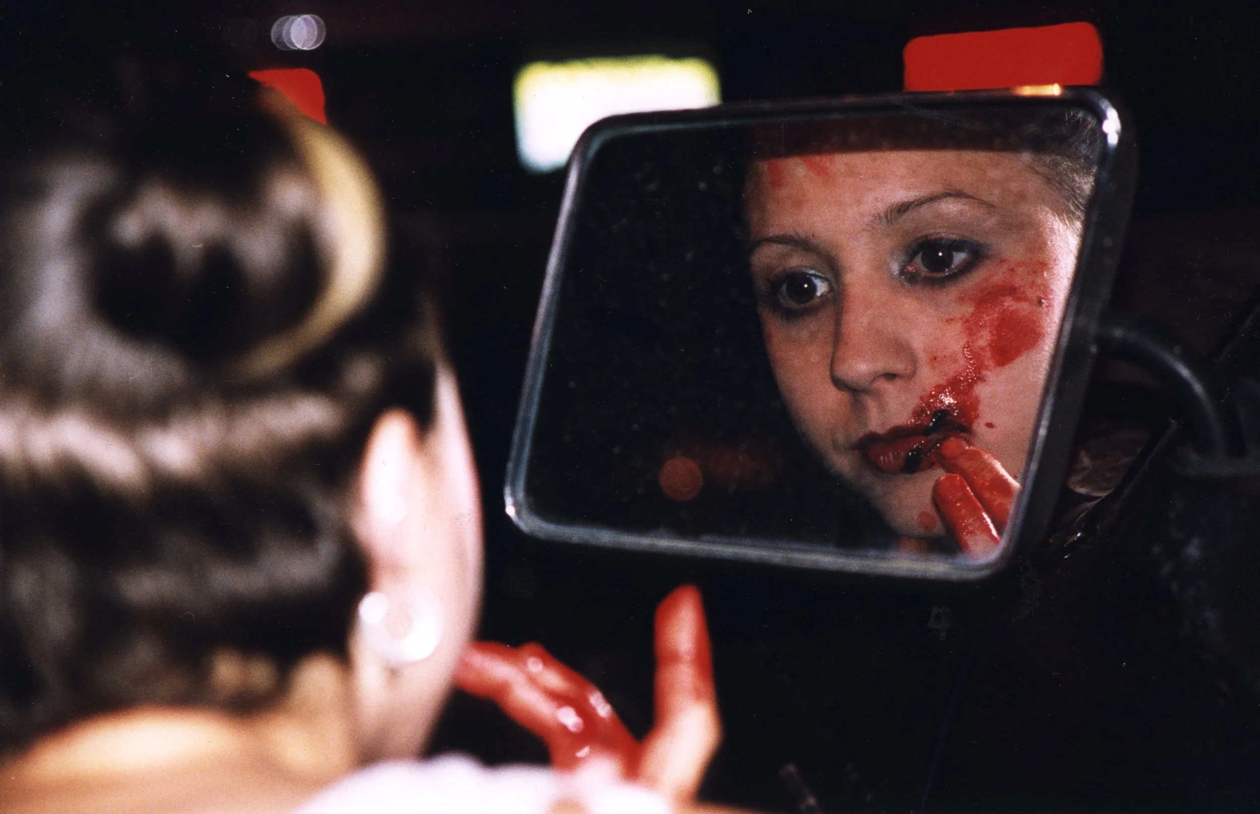 Independent film actress Katie Nisa on set of indie movie 'Threat' performing bloody horror scene in late-90s NYC.