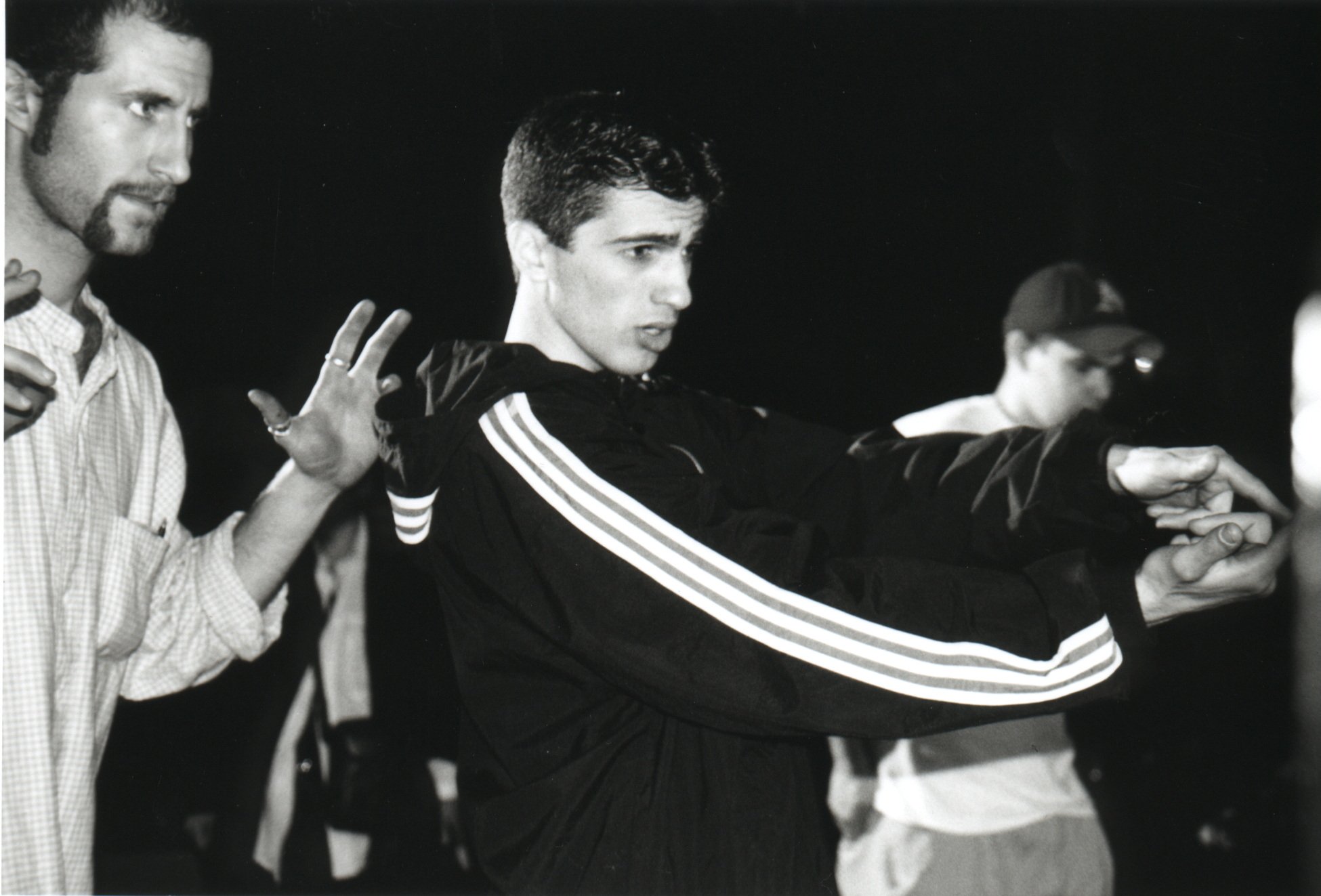 Independent filmmaker director Matt Pizzolo and cinematographer Ben Brancato compose a scene on-set of indie movie 'Threat' in 1990s NYC.