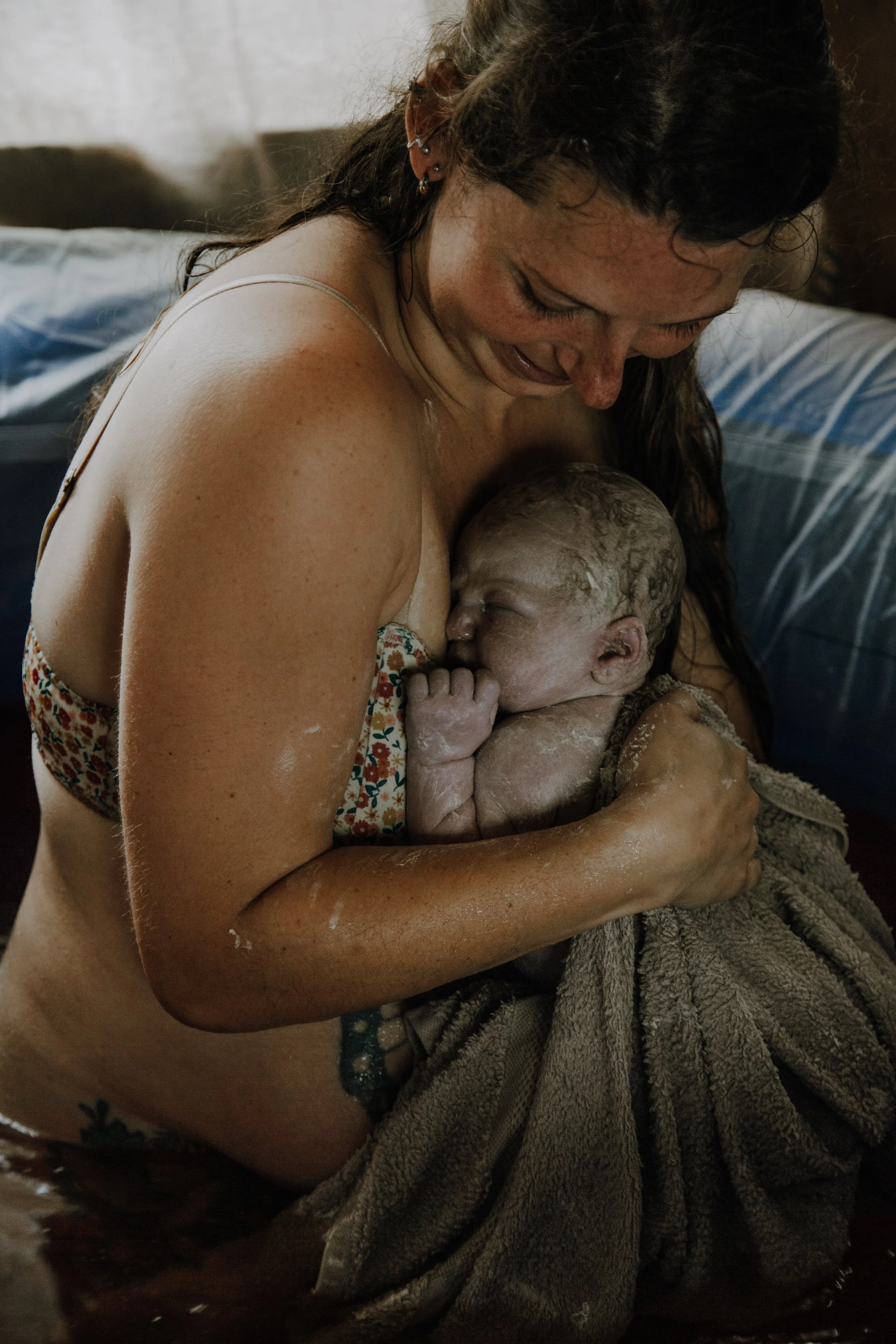 The first moments of skin to skin in a water birth at home.