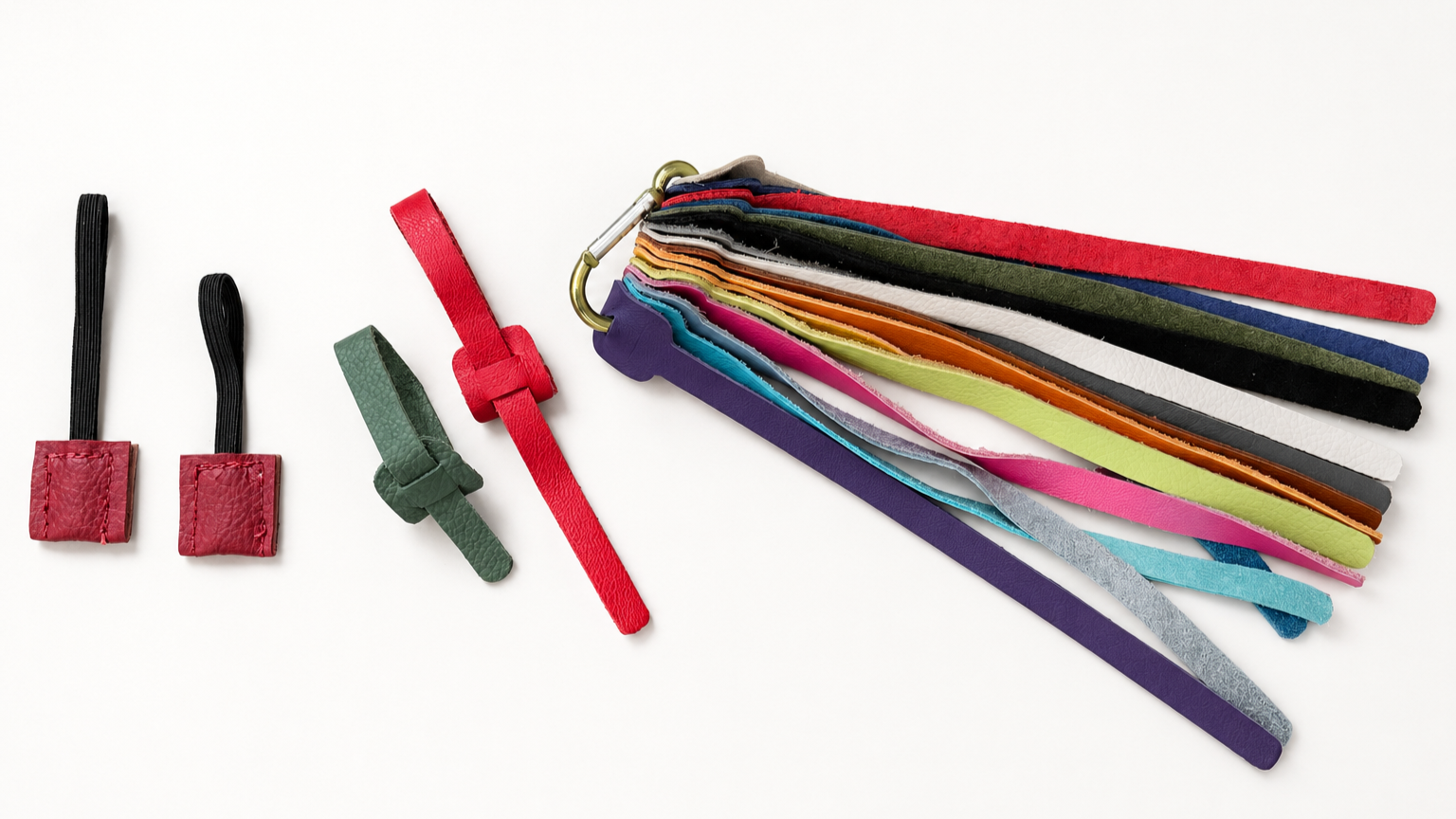 A set of colorful pet leashes and collars arranged on a white background, with the leashes gathered together on the right side and the collar tags on the left.