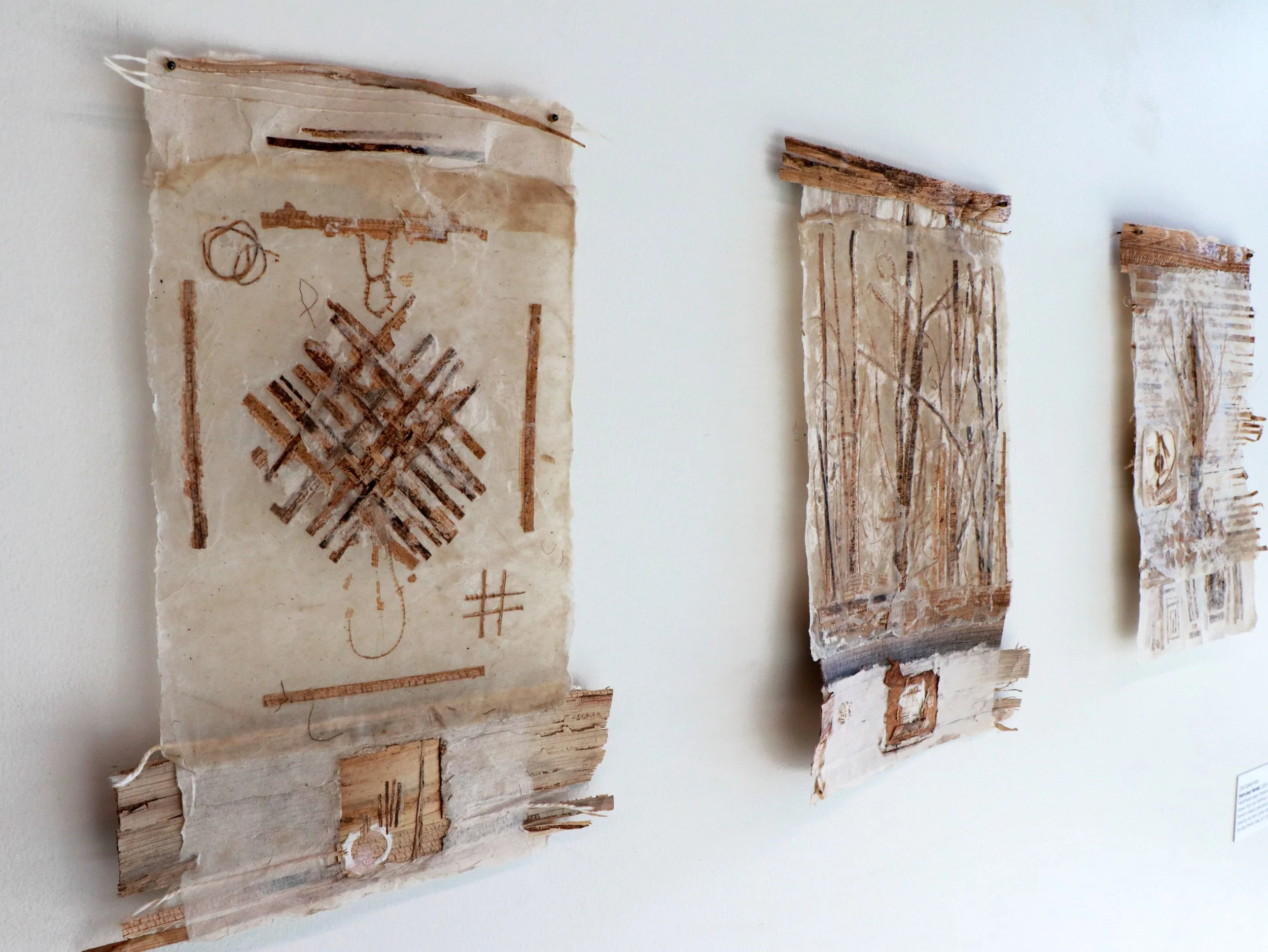 With your hands, 2026 | Handmade paper collection made from abaca pulp and embedded with banana leaves from my backyard in Waikoloa, pressed by my mom (grown by dad), thread, beeswax 