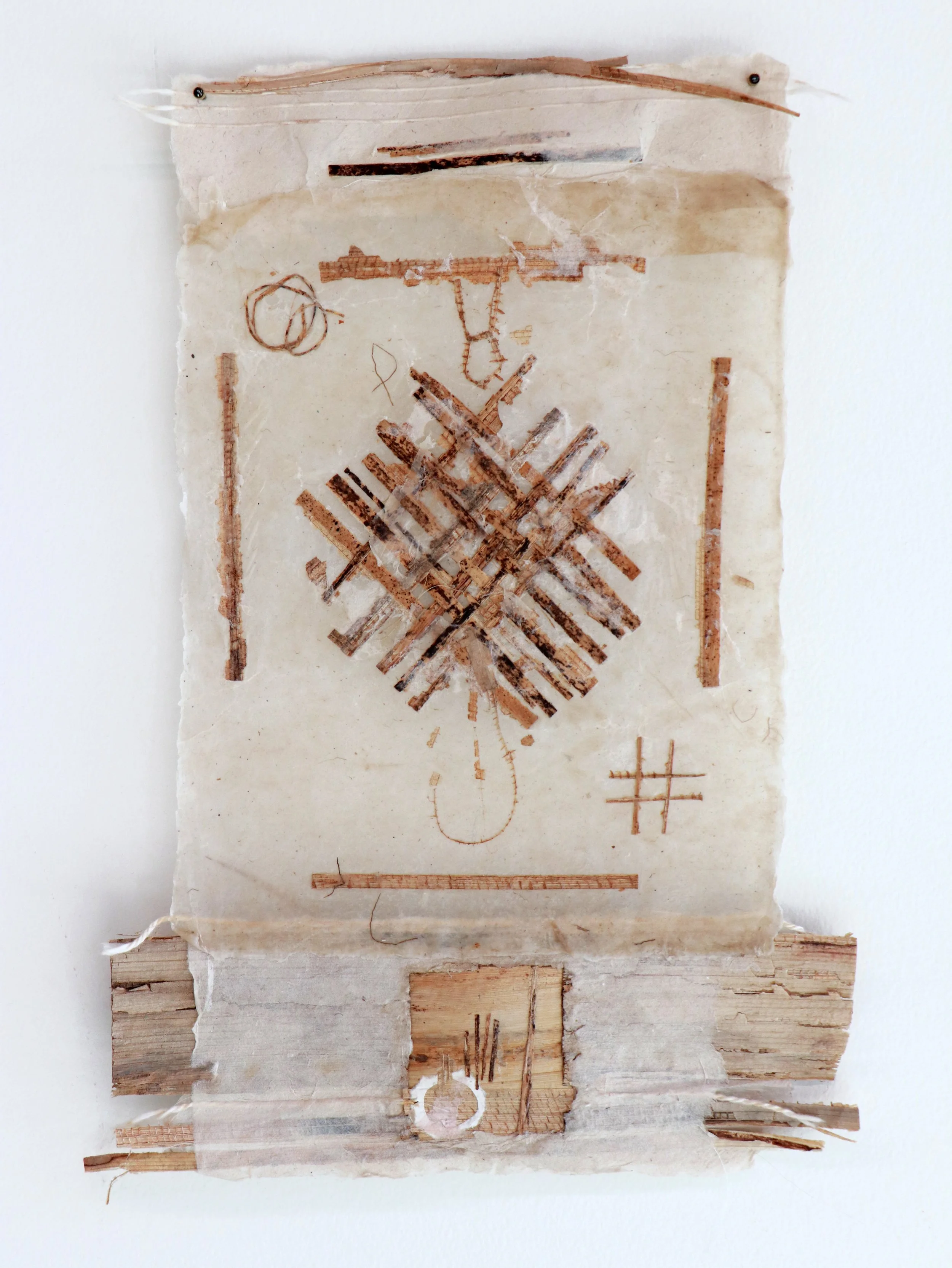 With your hands, 2026 | Handmade paper collection made from abaca pulp and embedded with banana leaves from my backyard in Waikoloa, pressed by my mom (grown by dad), thread, beeswax 