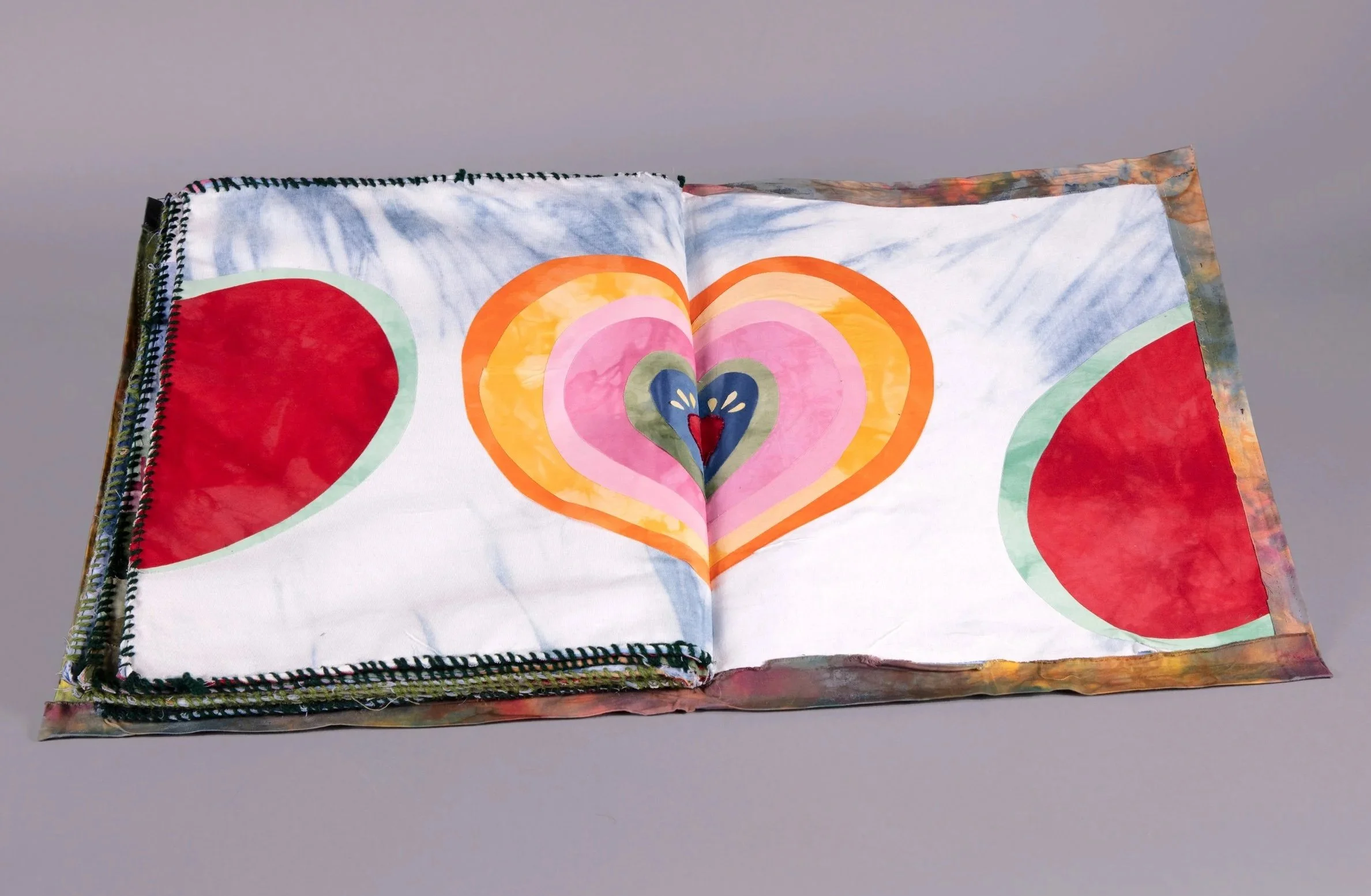 Make Friends of Fire, 2023 | Hand-dyed cotton, thread, book board