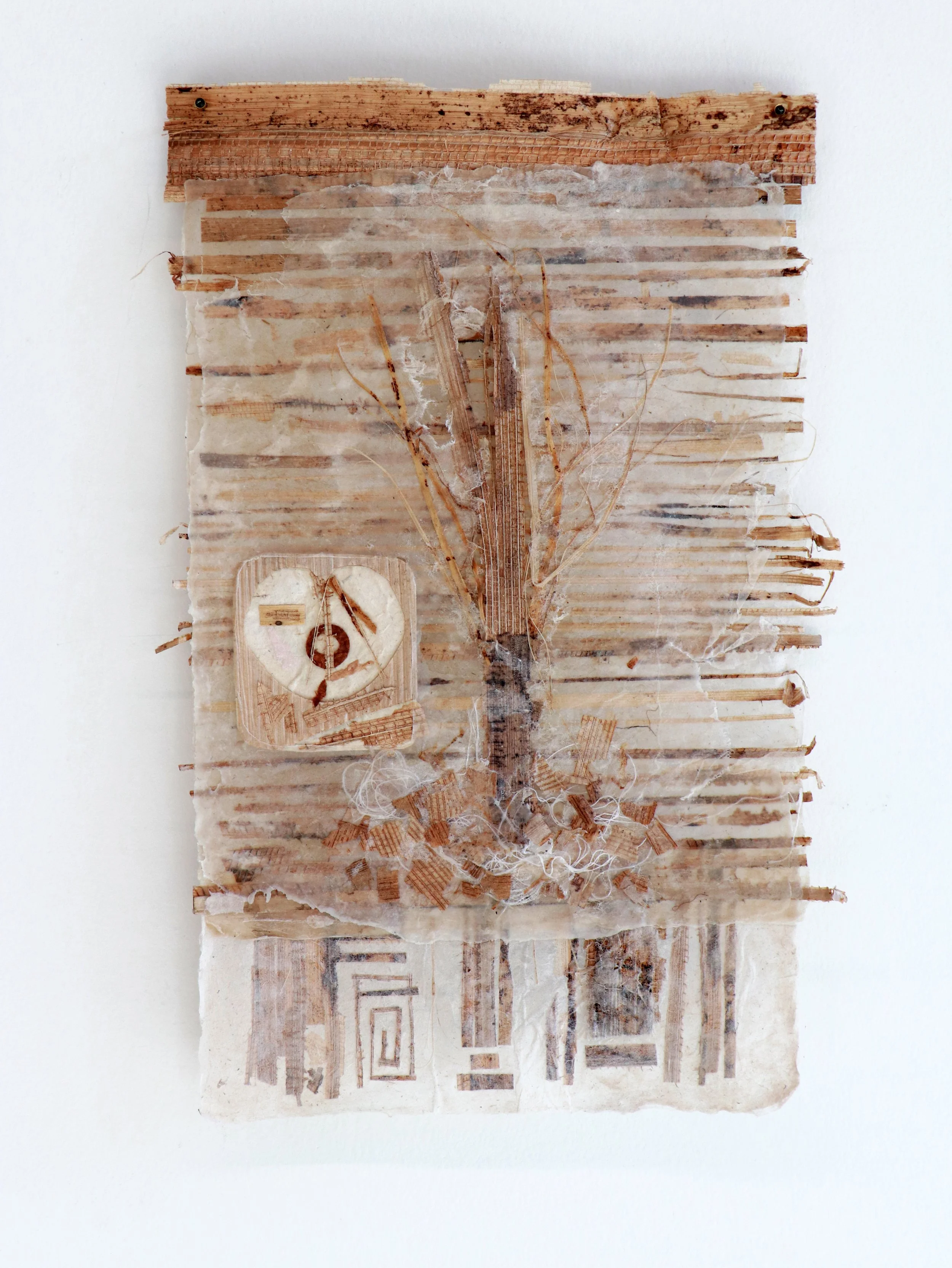 With your hands, 2026 | Handmade paper collection made from abaca pulp and embedded with banana leaves from my backyard in Waikoloa, pressed by my mom (grown by dad), thread, beeswax 