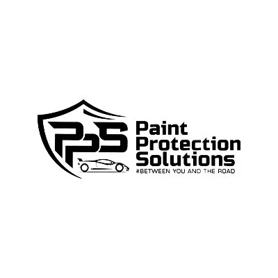 Logo for Paint Protection Solutions featuring a shield, the letters P, P, S, a car outline, and the tagline "Between You and the Road."