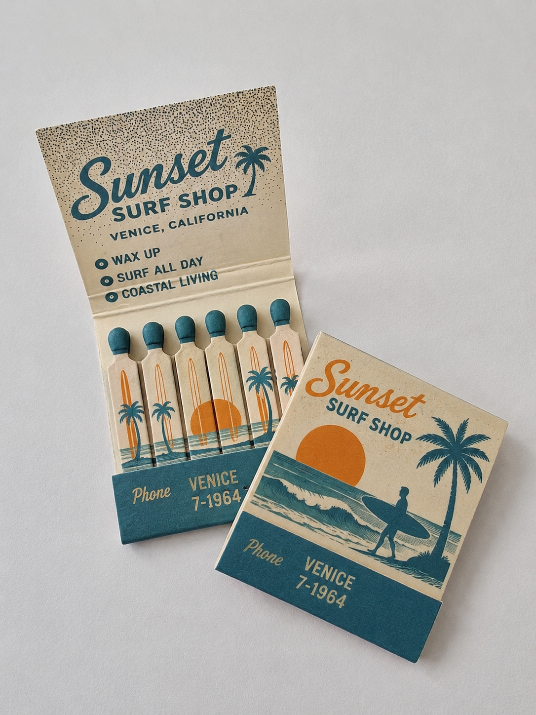 Custom printed matchbooks with a vintage surf shop design, featuring illustrated palm trees, sunset colours and personalised matchsticks.