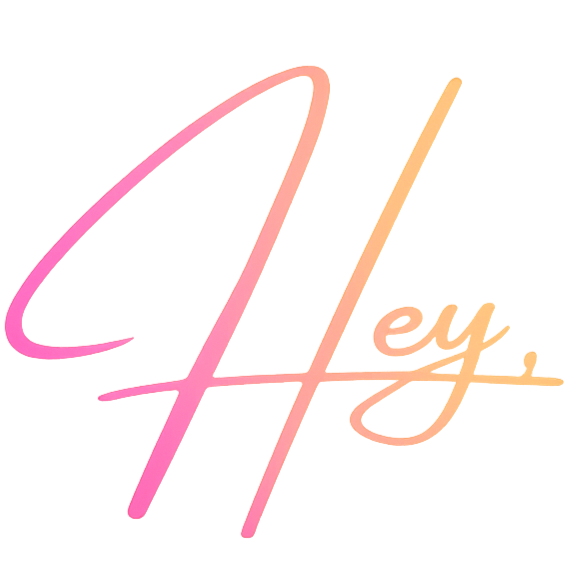 Neon sign spelling 'hey' with cursive writing in pink and orange pastel colors.