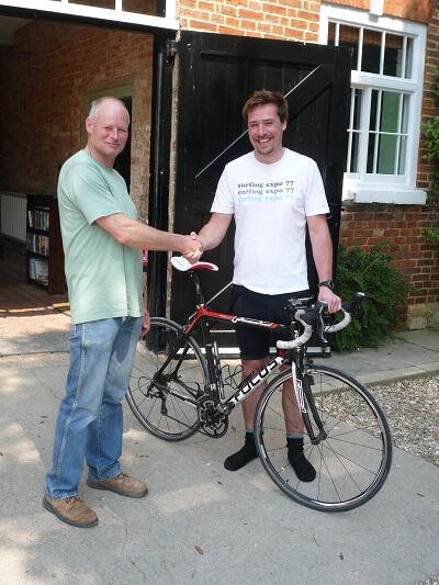 Cyclist arriving at the Coach House