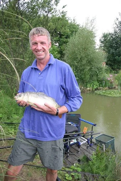 Holding fish caught in lake