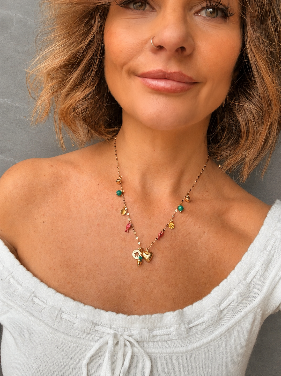 Delicate gold charm necklace