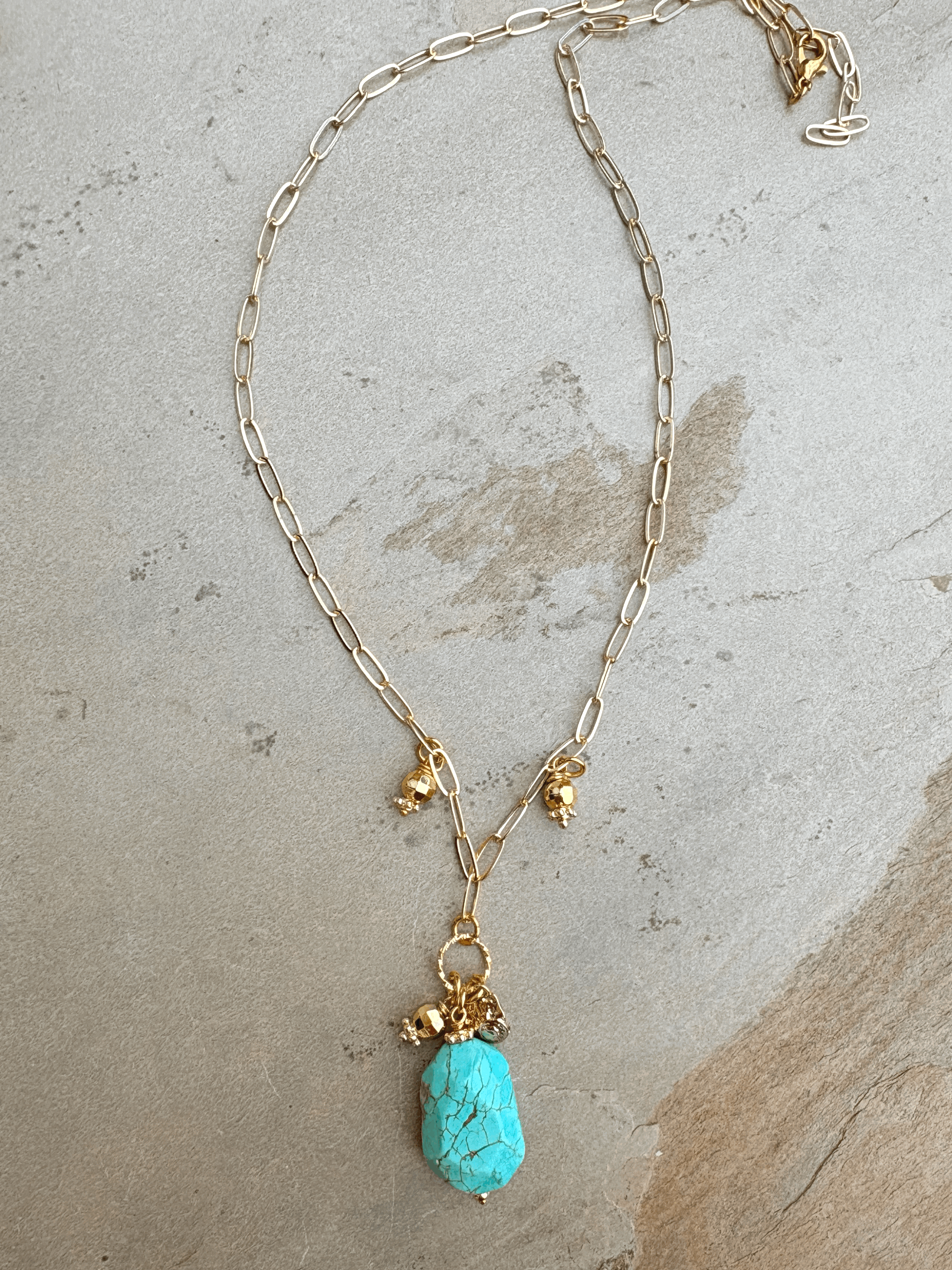Long, turquoise pendant necklace