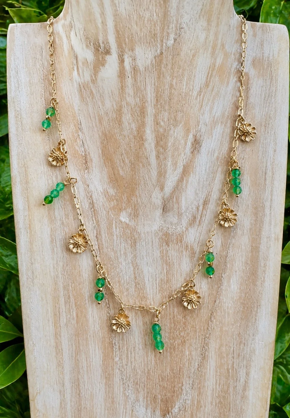 Flower charm and green bead necklace