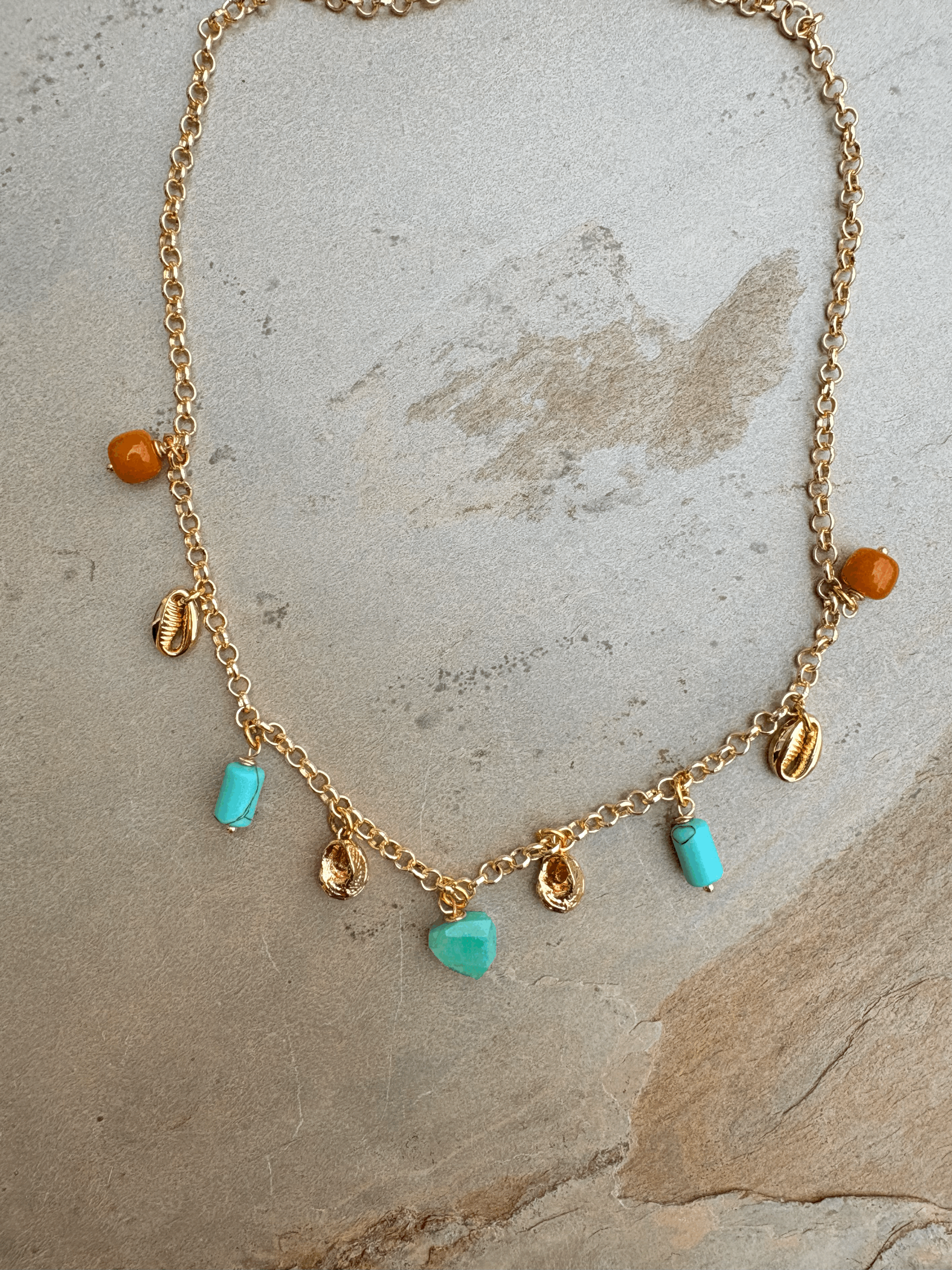 Turquoise, amber and gold charm necklace
