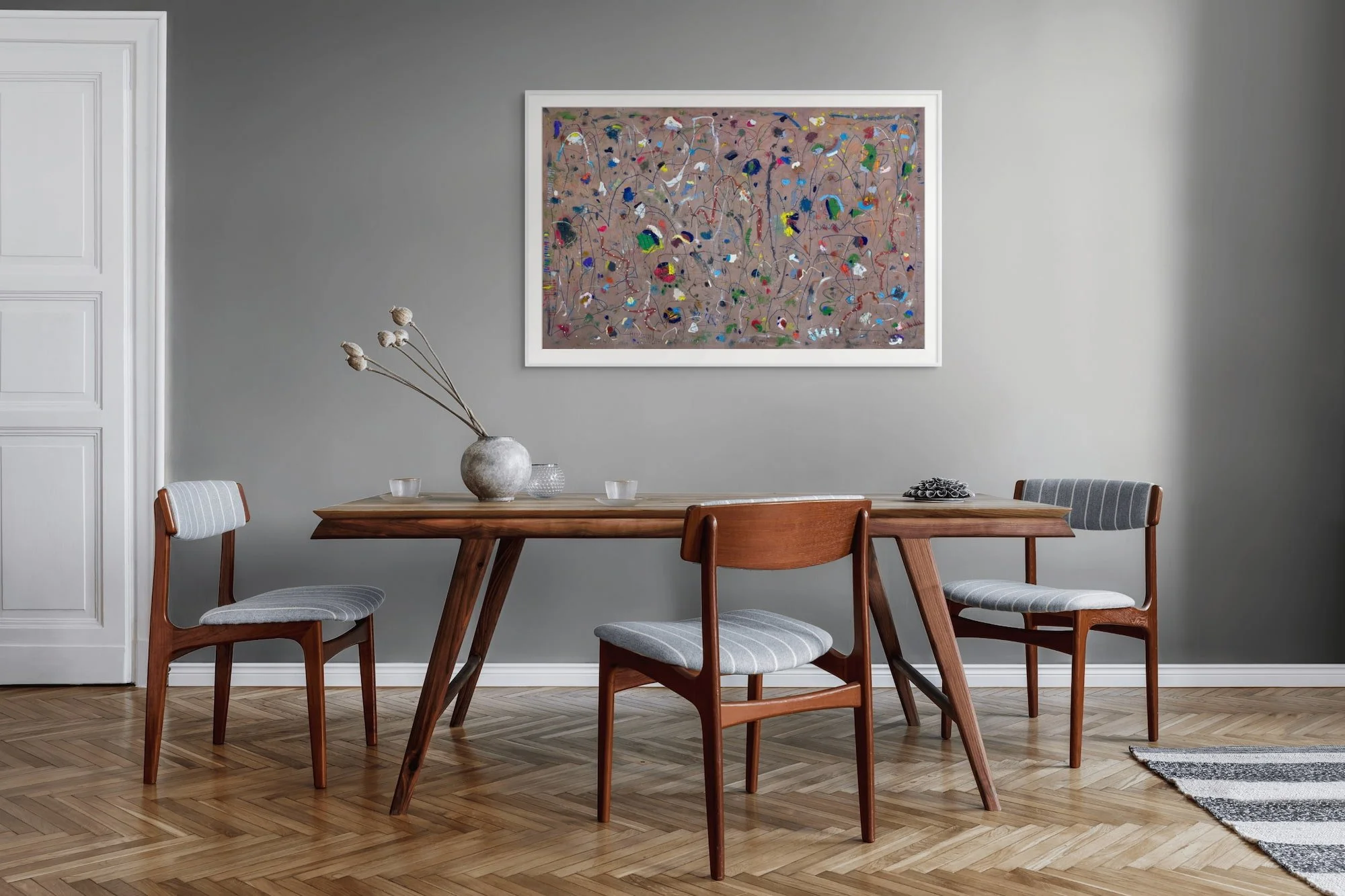 Confetti in a Windstorm large abstract painting by Marcus Bacher in mid-century modern dining room with teak table