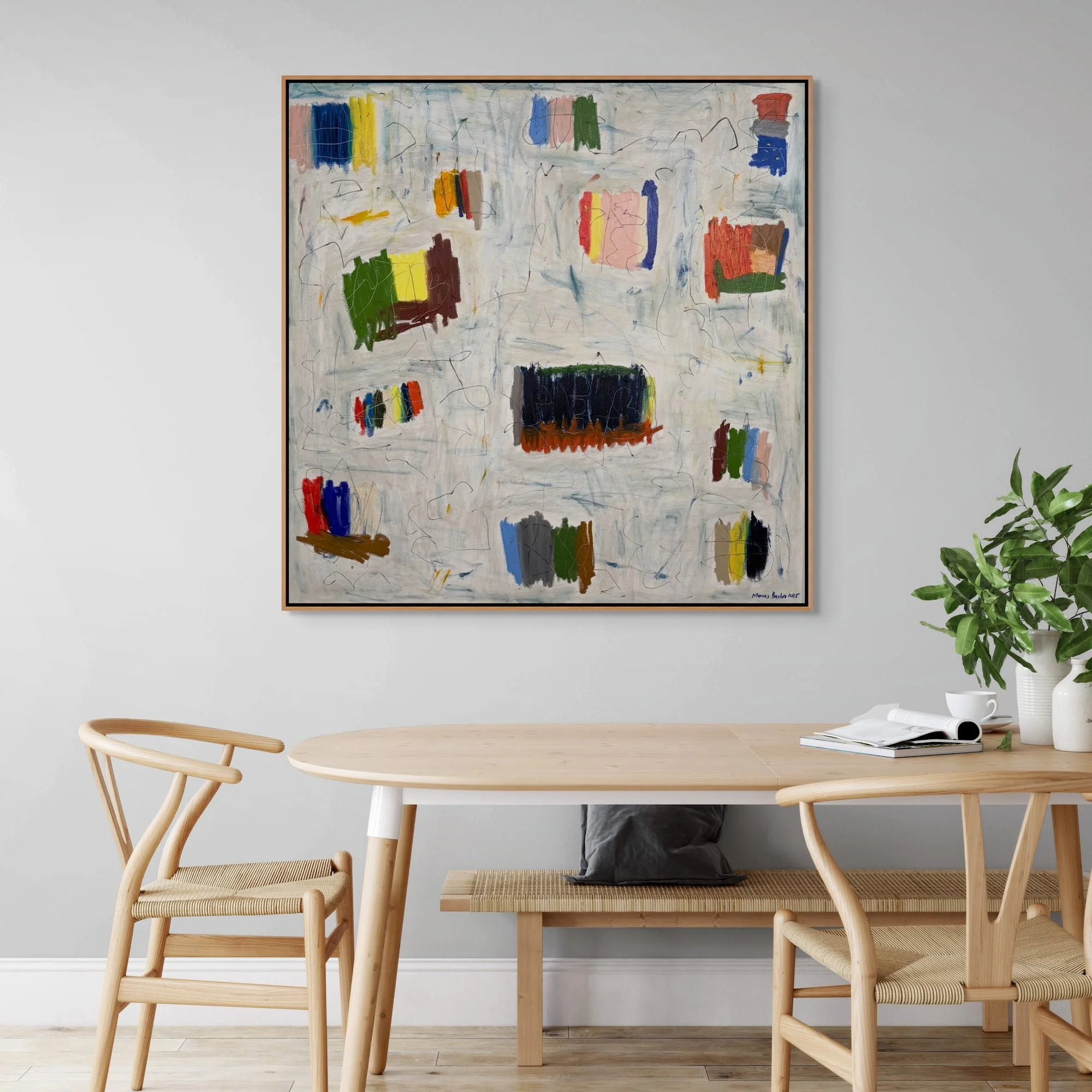Muizenberg large square abstract painting by Marcus Bacher displayed with Scandinavian dining room table interior