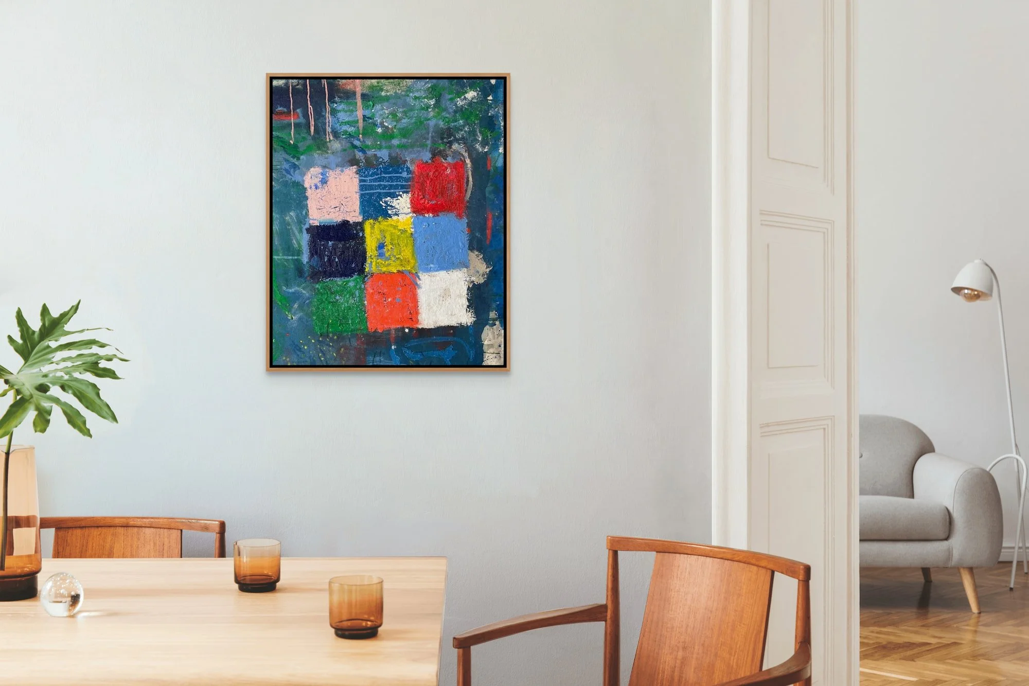 Nine Colored Blocks abstract painting by Marcus Bacher displayed in modern dining room