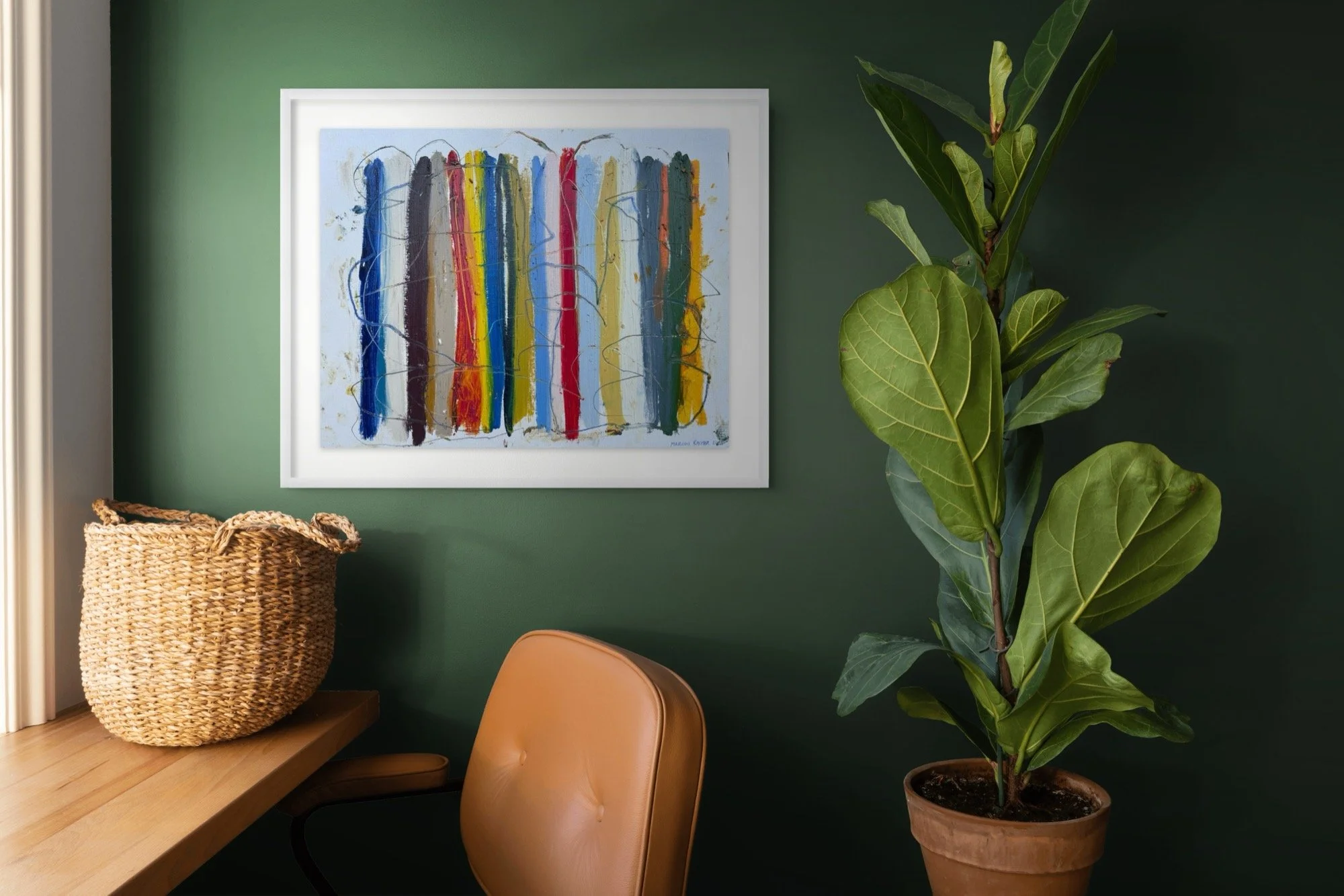 Shoreline Stripes II, 20x24 framed original abstract painting in oil sticks and markers on paper by Marcus Bacher, framed on a deep green wall beside a leather chair and a fiddle-leaf fig.