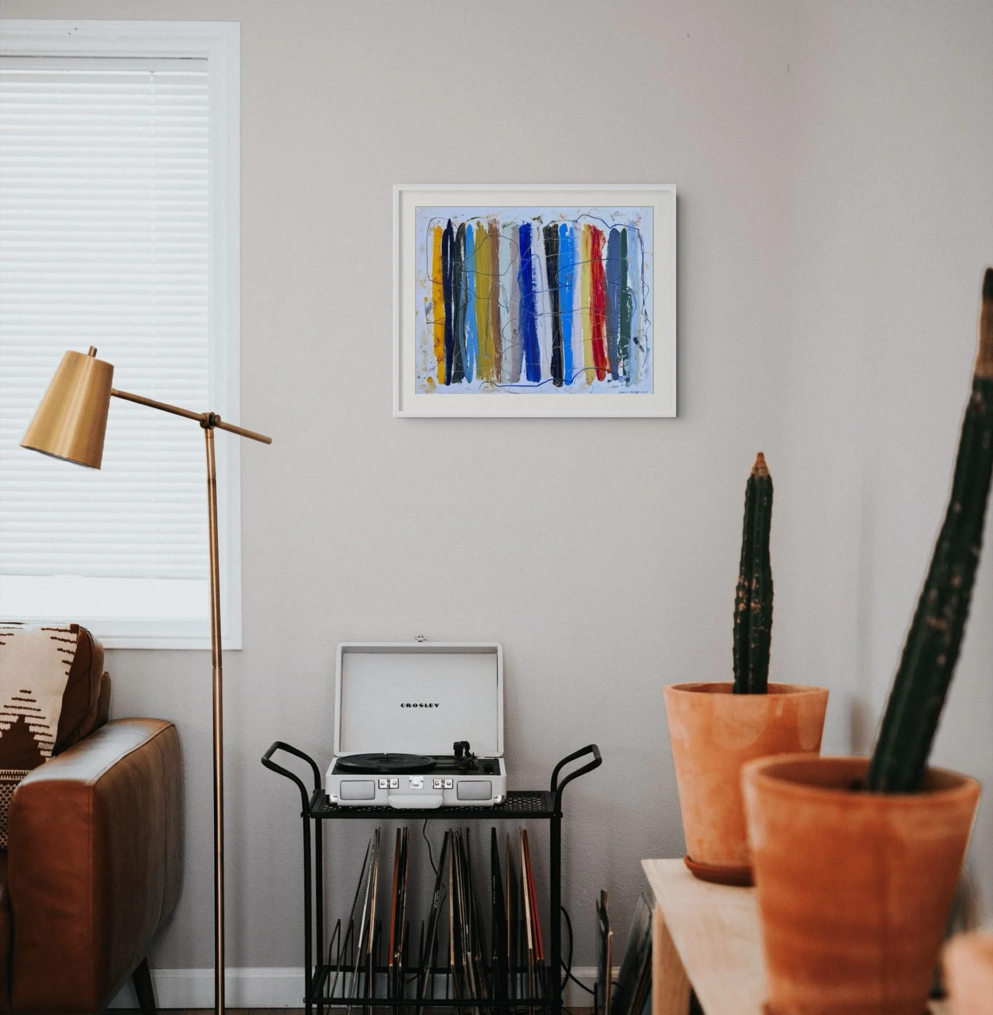 Shoreline Stripes by Marcus Bacher, framed in a mid-century living room above a record player.