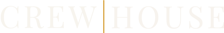 The image displays the words 'CREW' and 'HOUSE' on a black background, separated by a vertical gold line.