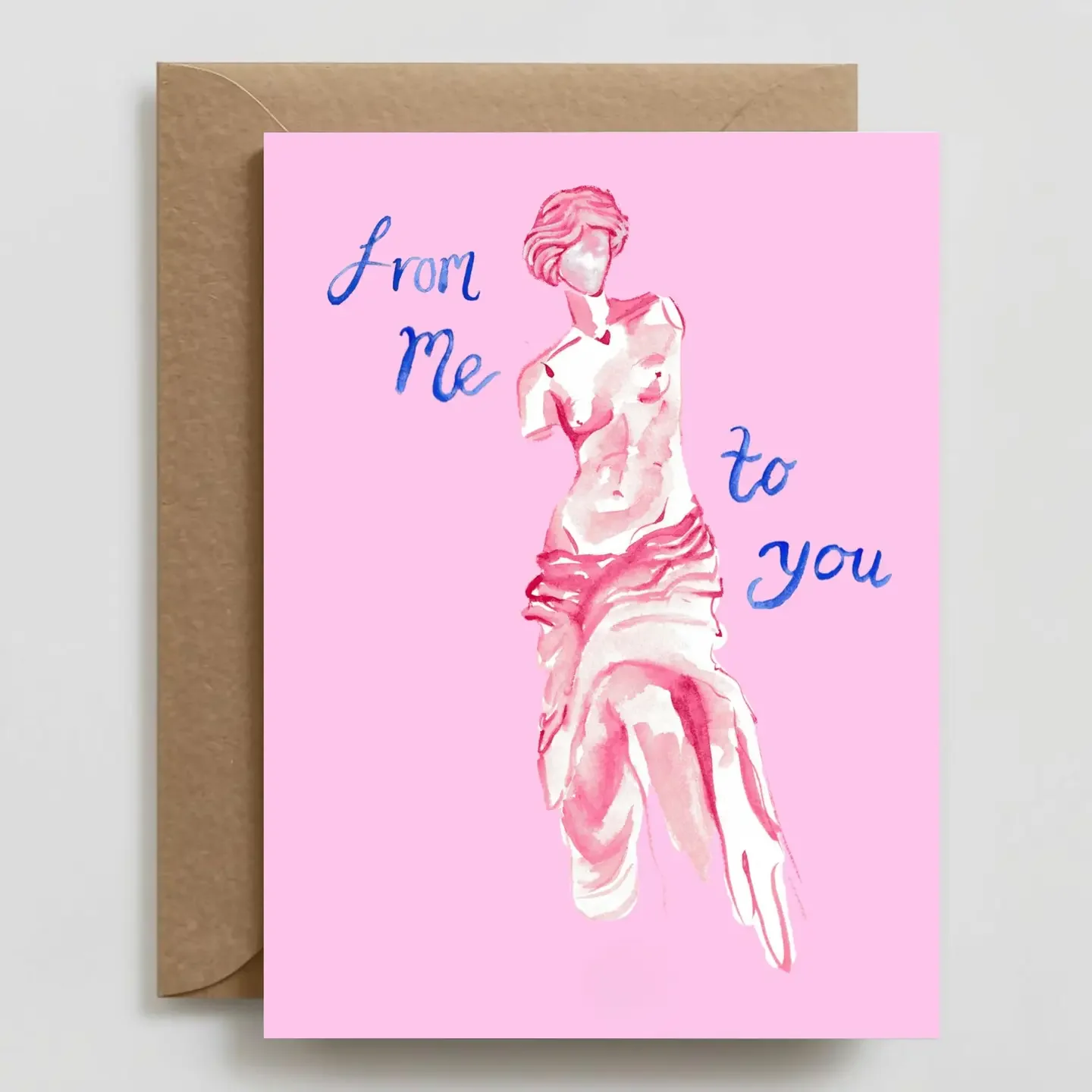A pink greeting card featuring a watercolor-style sketch of a nude woman with short hair and a sensual pose. Text on the card reads "from me to you" in blue cursive lettering.