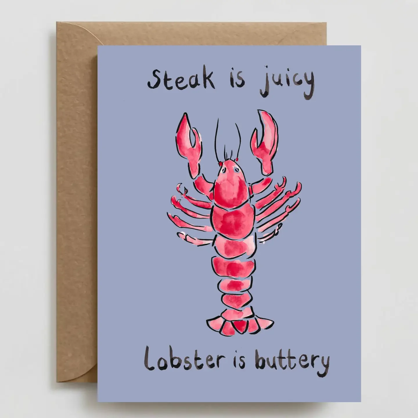 A greeting card with a watercolor illustration of a pink lobster and the humorous phrase "Lobster is buttery" underneath.