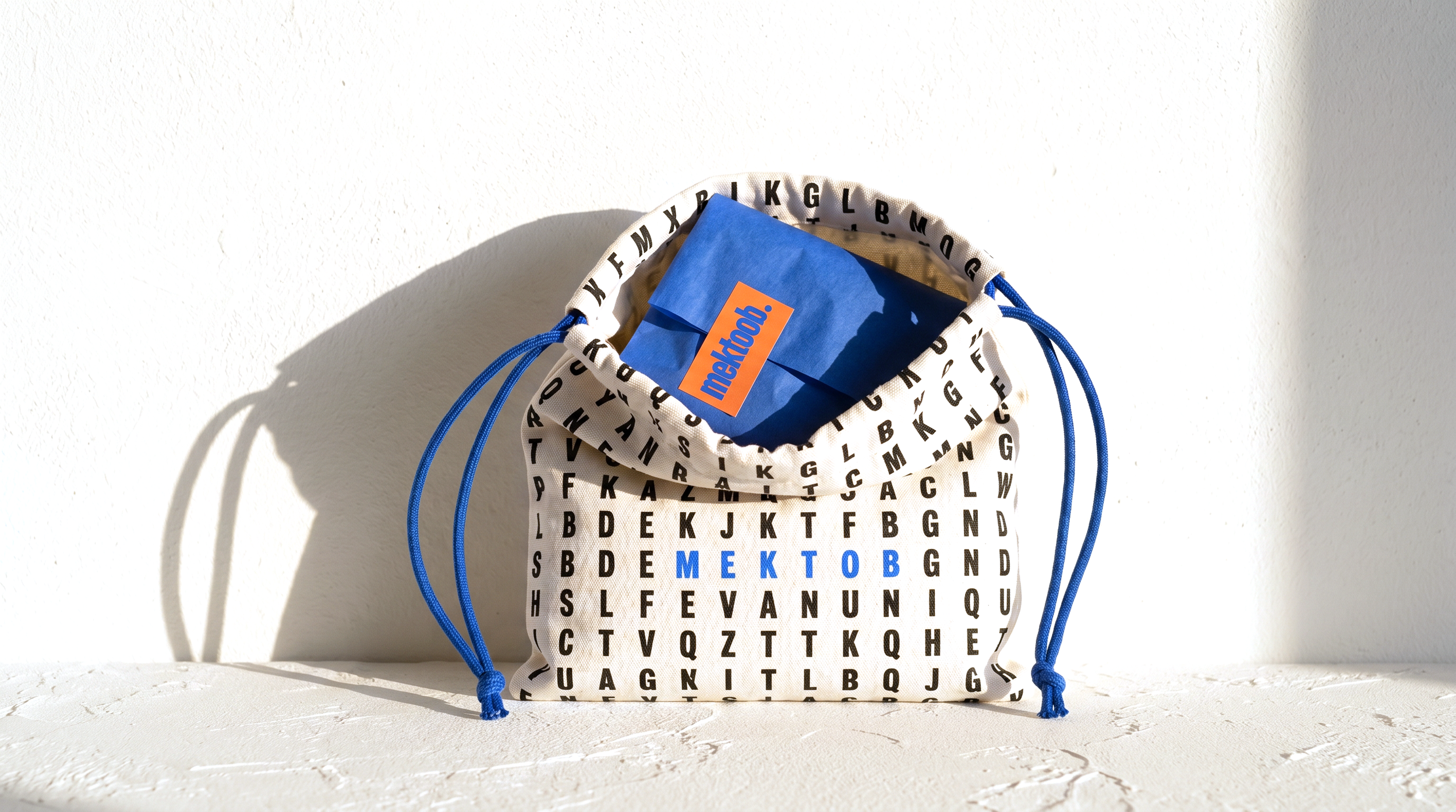 wrapping+dust-bag-bleu-orange.png