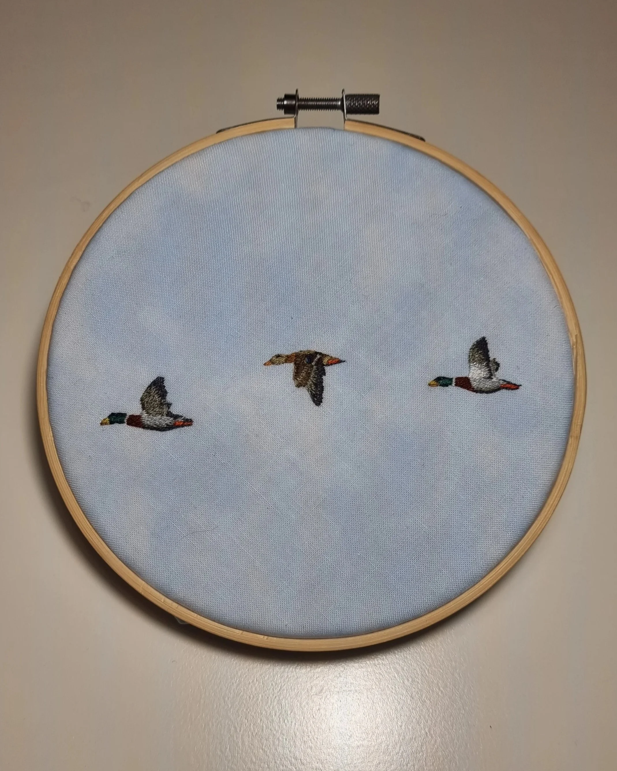 Embroidered flying ducks of my own design.