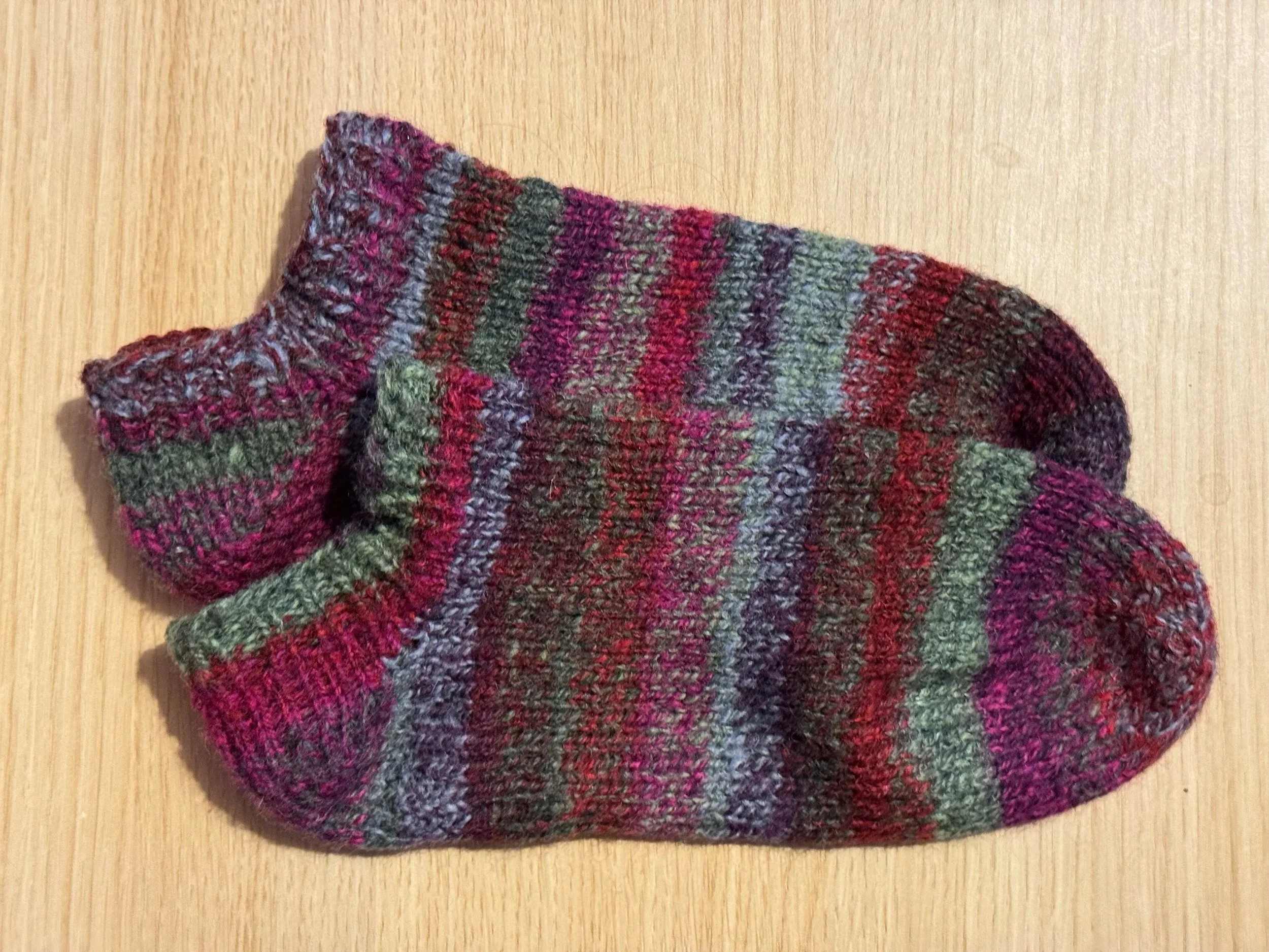 Knitted with my own handspun yarn. Pattern: Magic No Gauge Socks by Dawn Prickett