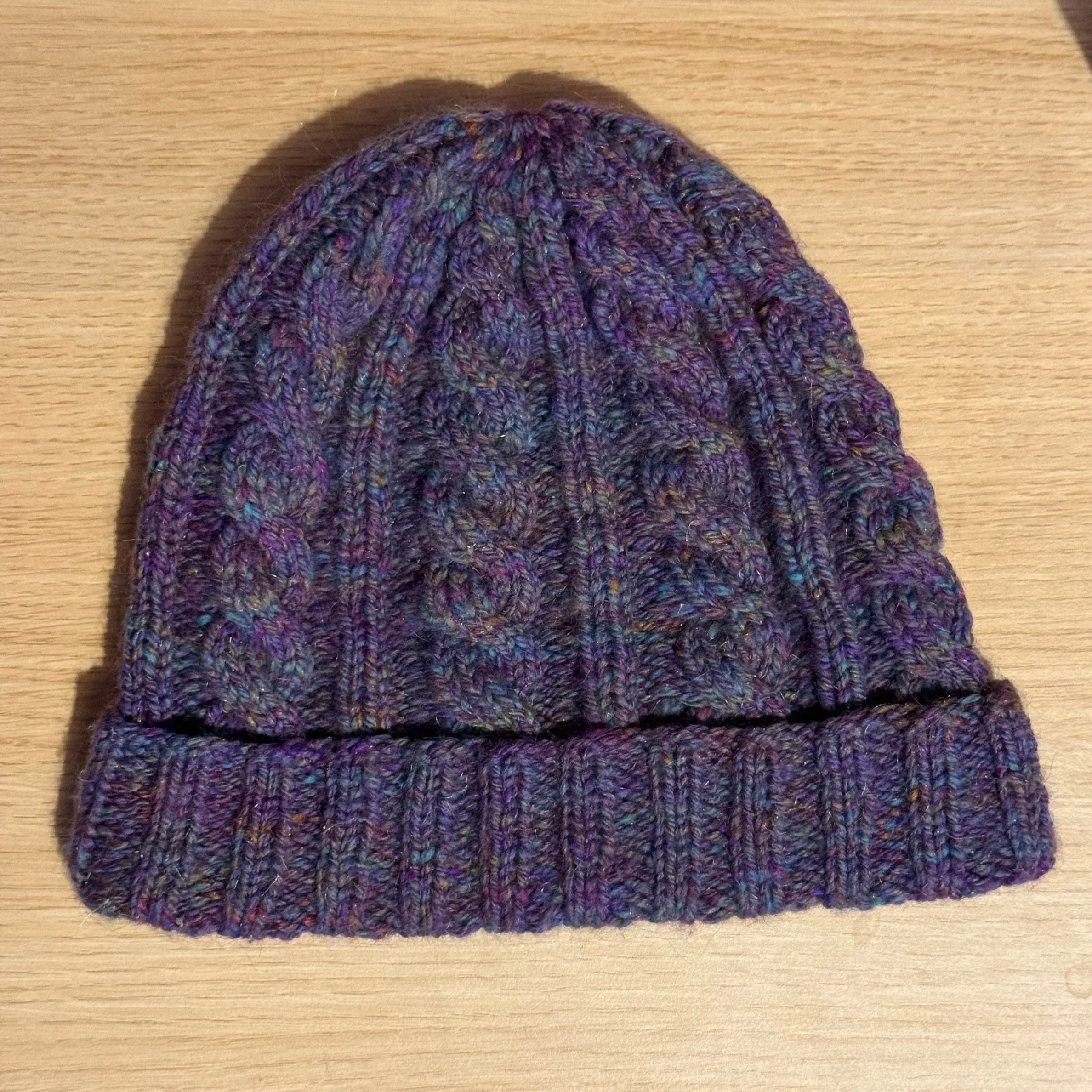 Knitted with my own handspun yarn. Pattern: Jason's Cashmere Hat by Melissa Thomson.