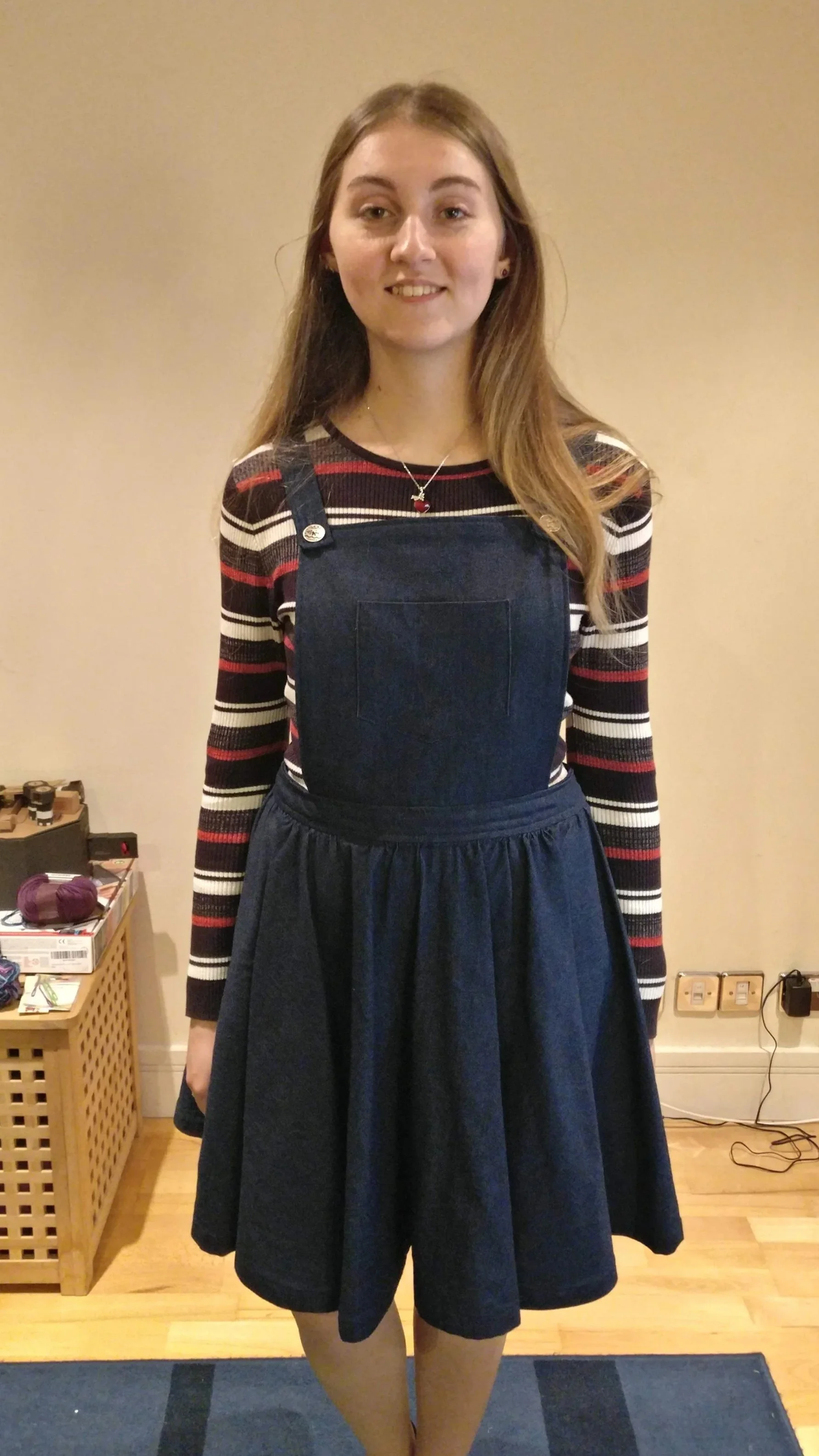 Denim overall dress.