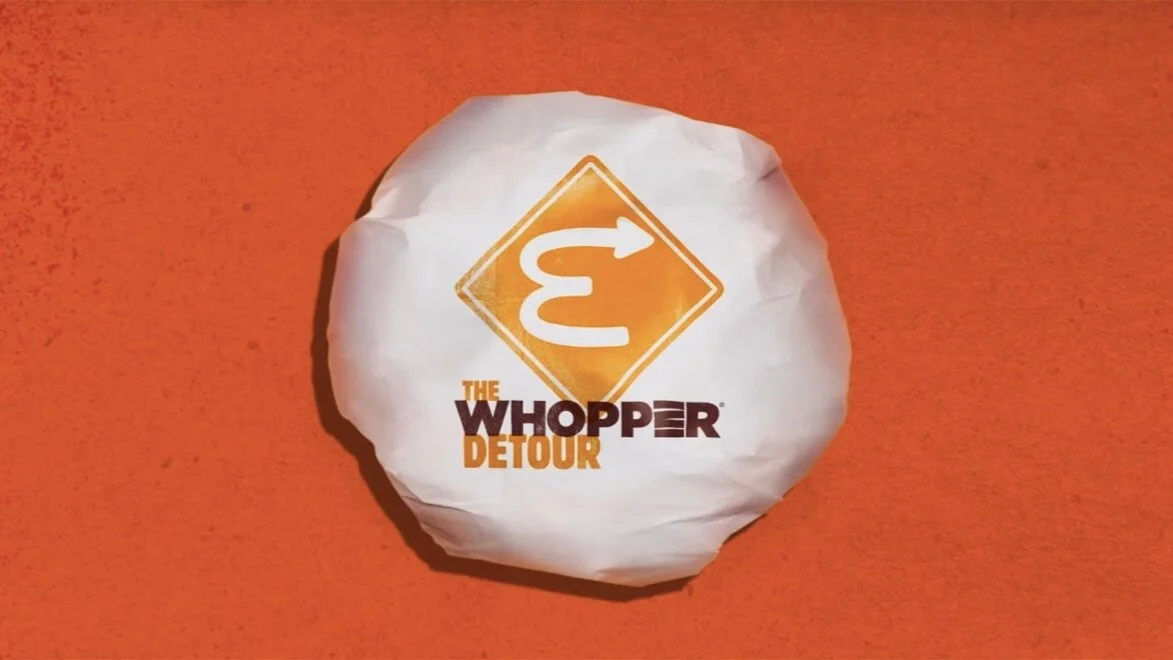 Drive up to McDonald’s and unlock Burger King’s one-cent whopper via the Burger King app. (Image from adweek.com)