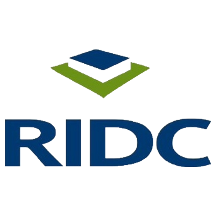 Close-up of a logo featuring a 3D green and blue cube above the bold, uppercase text 'RIDC' in dark blue.